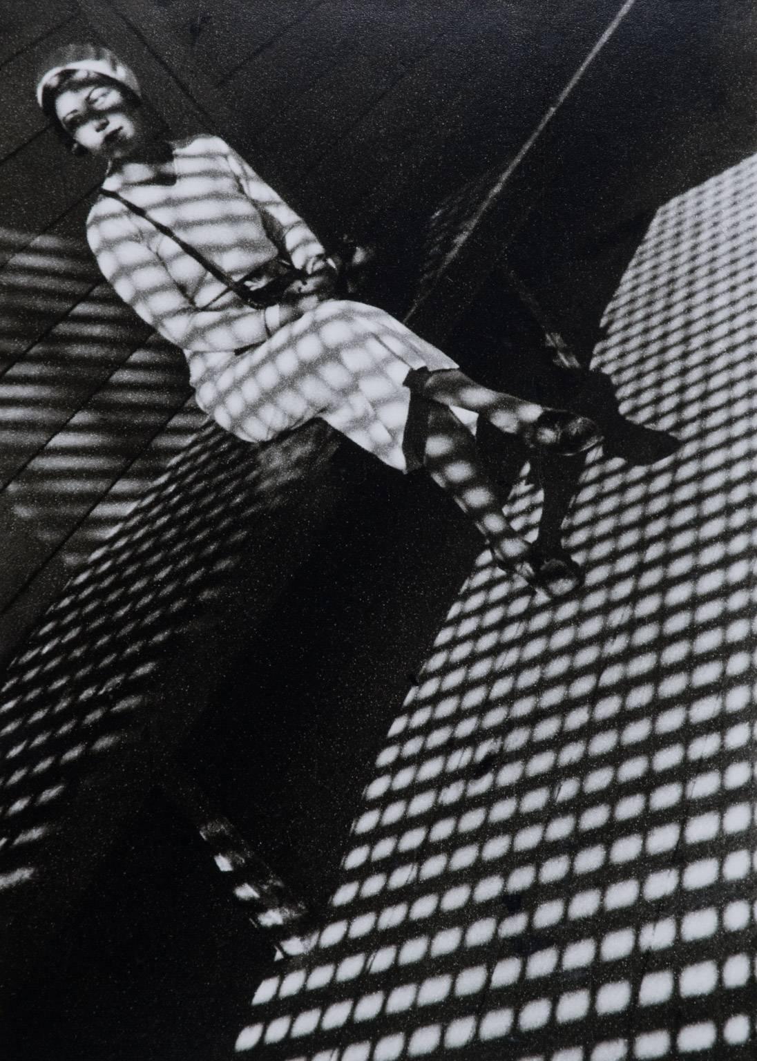 Alexander Rodchenko Black and White Photograph - Girl with Leica