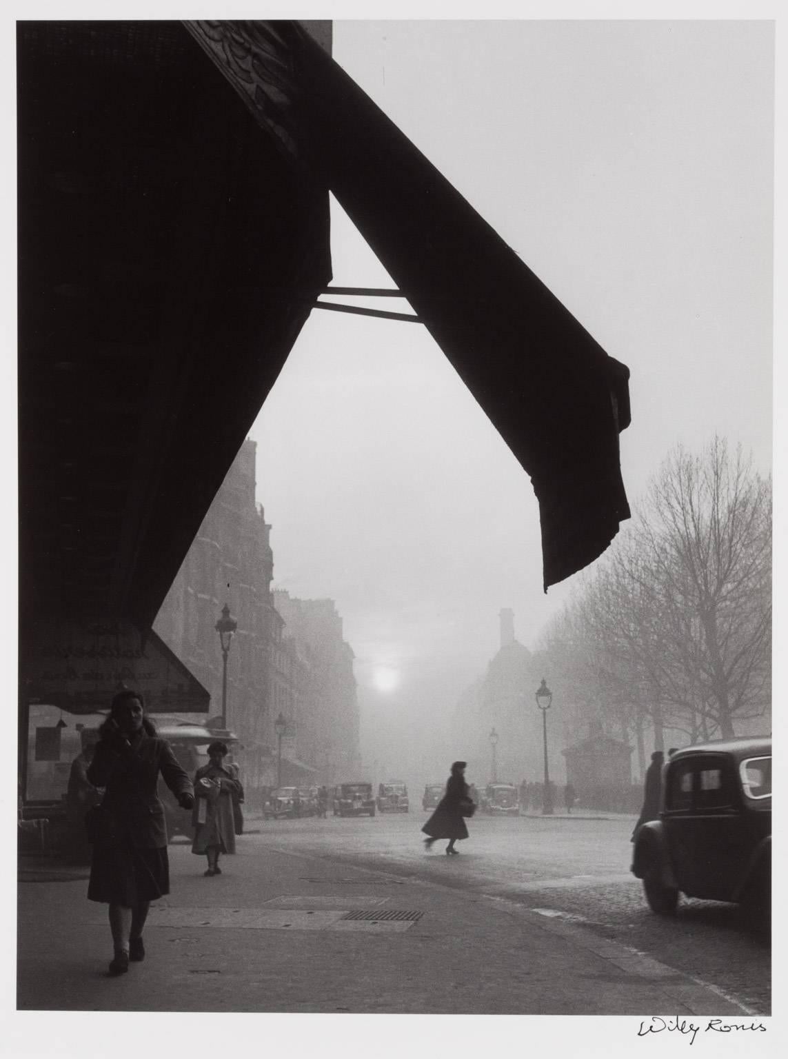 Carrefour Sèvres-Babylone, Paris - Photograph by Willy Ronis