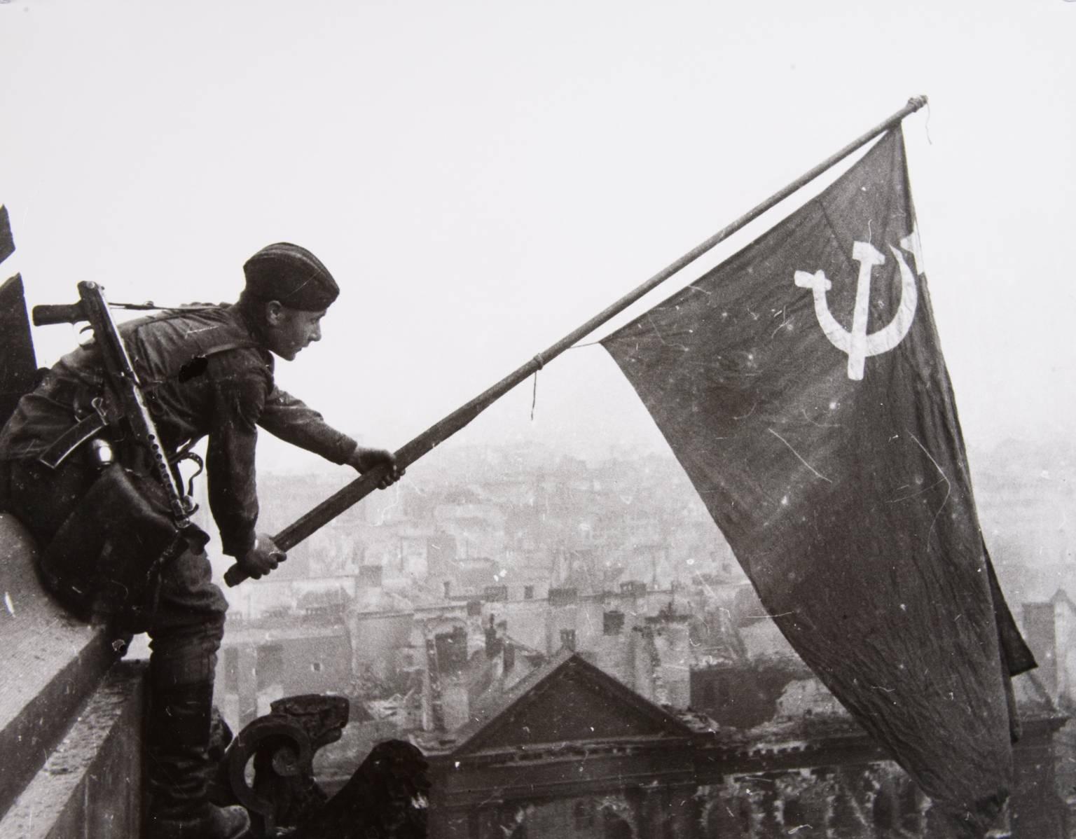 Yevgeny Khaldei Black and White Photograph - Raising the Hammer and Sickle over the Reichstag (variant 2)