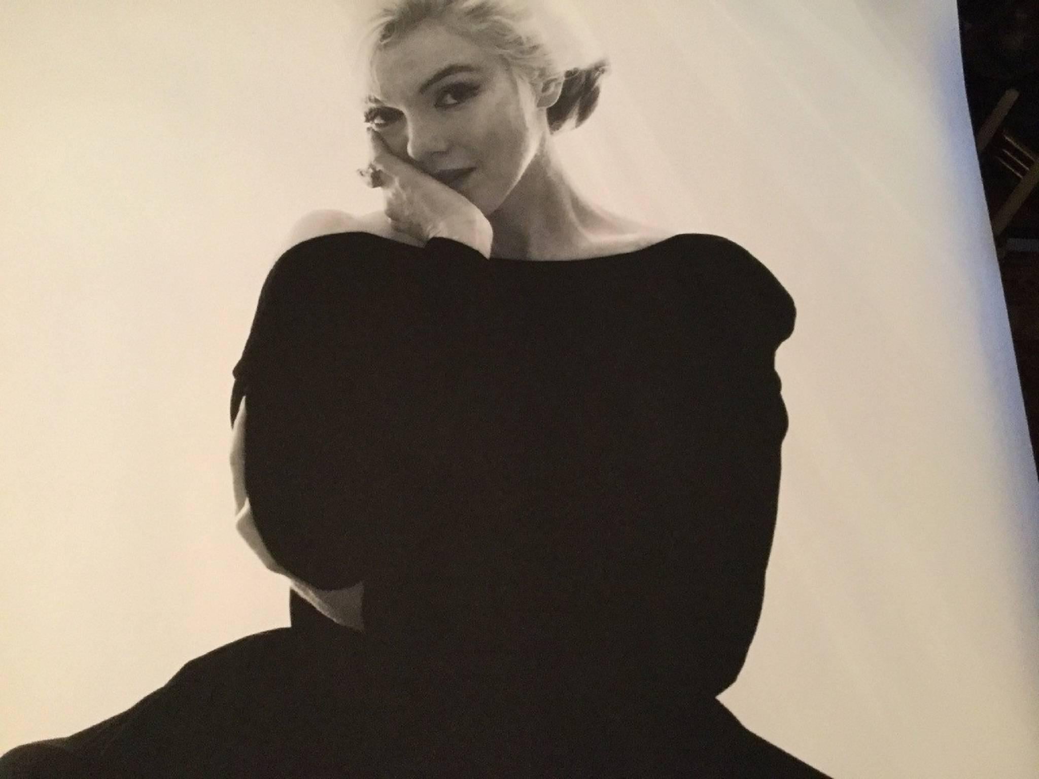 Bert Stern Portrait Photograph - Marilyn in the black dress looking at you