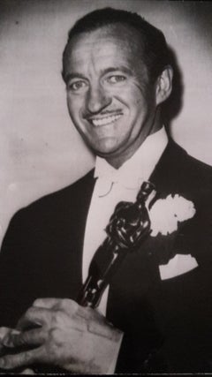 The English Actor David Niven receiving the Oscar, 1959