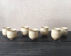 Set of Seven Cream Speckled Cups by Shiro Shimizu