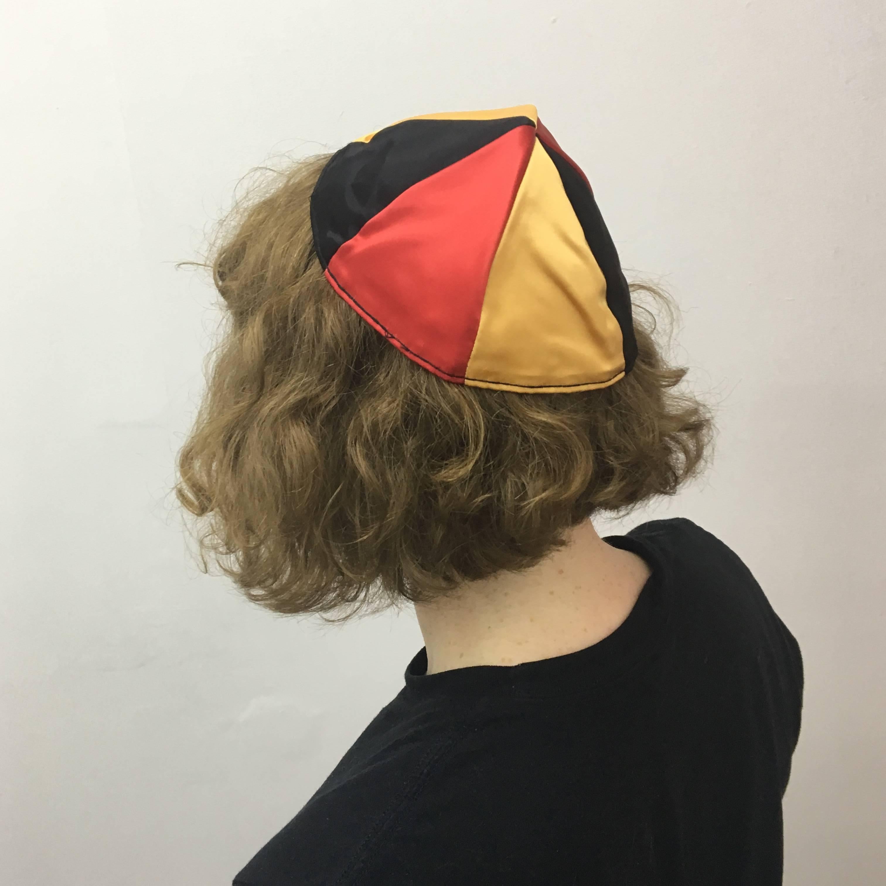 German Yarmulke (Thanks for Remembering), 1995
Satin yarmulke - red, black and gold
Signed

For decades, Leibowitz has been the New York art world’s master painter of abjection and neuroses, with mockingly self-abasing work that mixes elements of