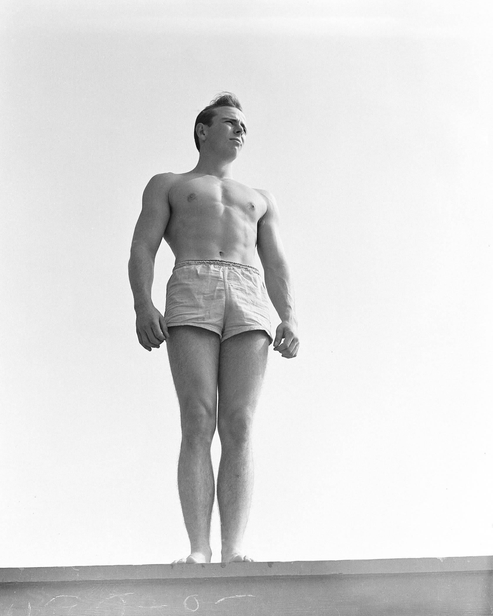Bob Mizer Portrait Photograph - Unknown on Platform, Santa Monica
