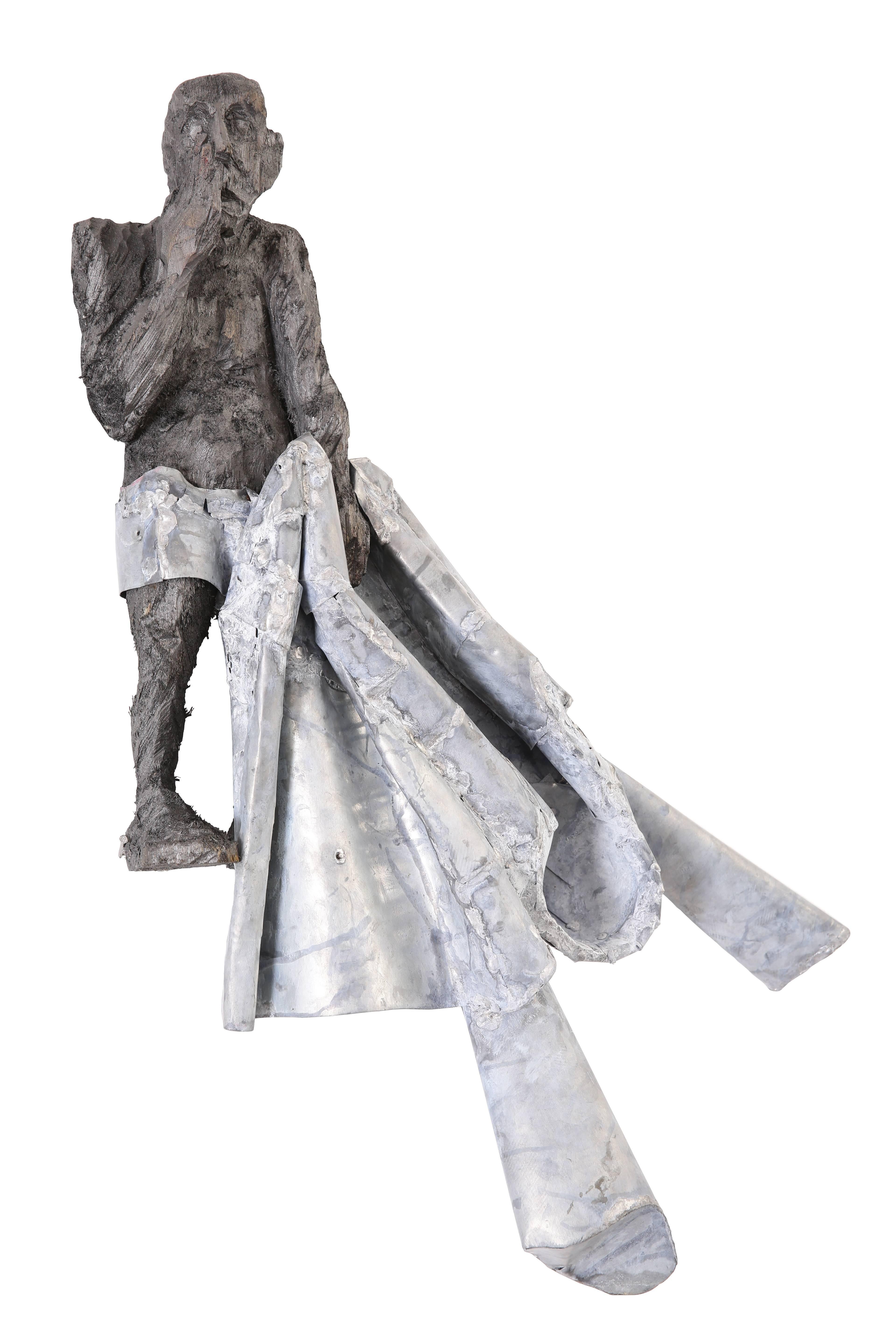 Aurel Vlad Figurative Sculpture - Man out of shadow