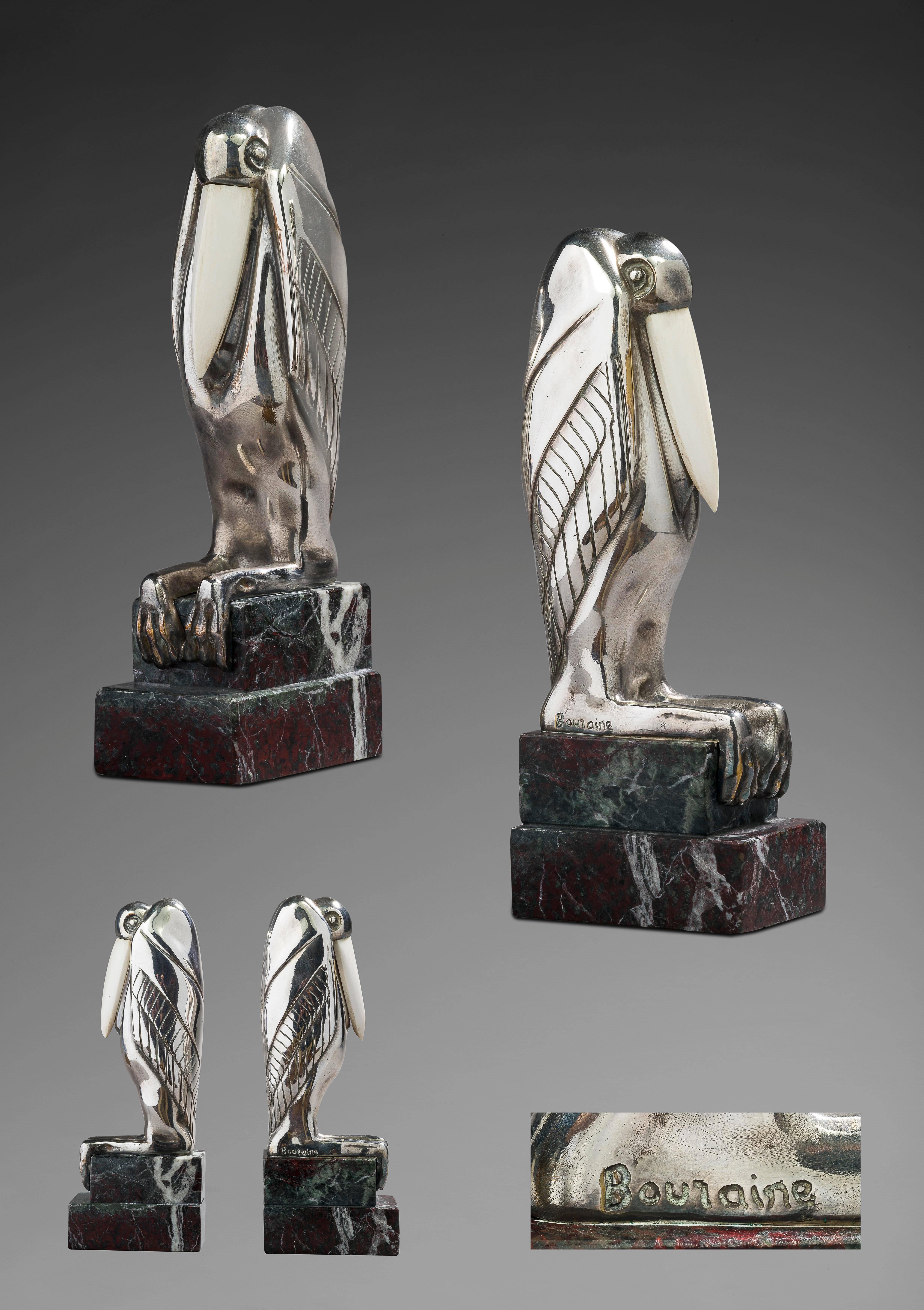 Marcel Bouraine
1886-1948

Serre livres aux Marabouts 
Bronce con pátina de plata, criselefantina
Firmado en la base 

9