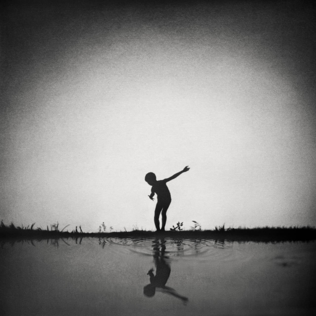 Xiaoliang Huang Black and White Photograph - Stone Skipping, 2012