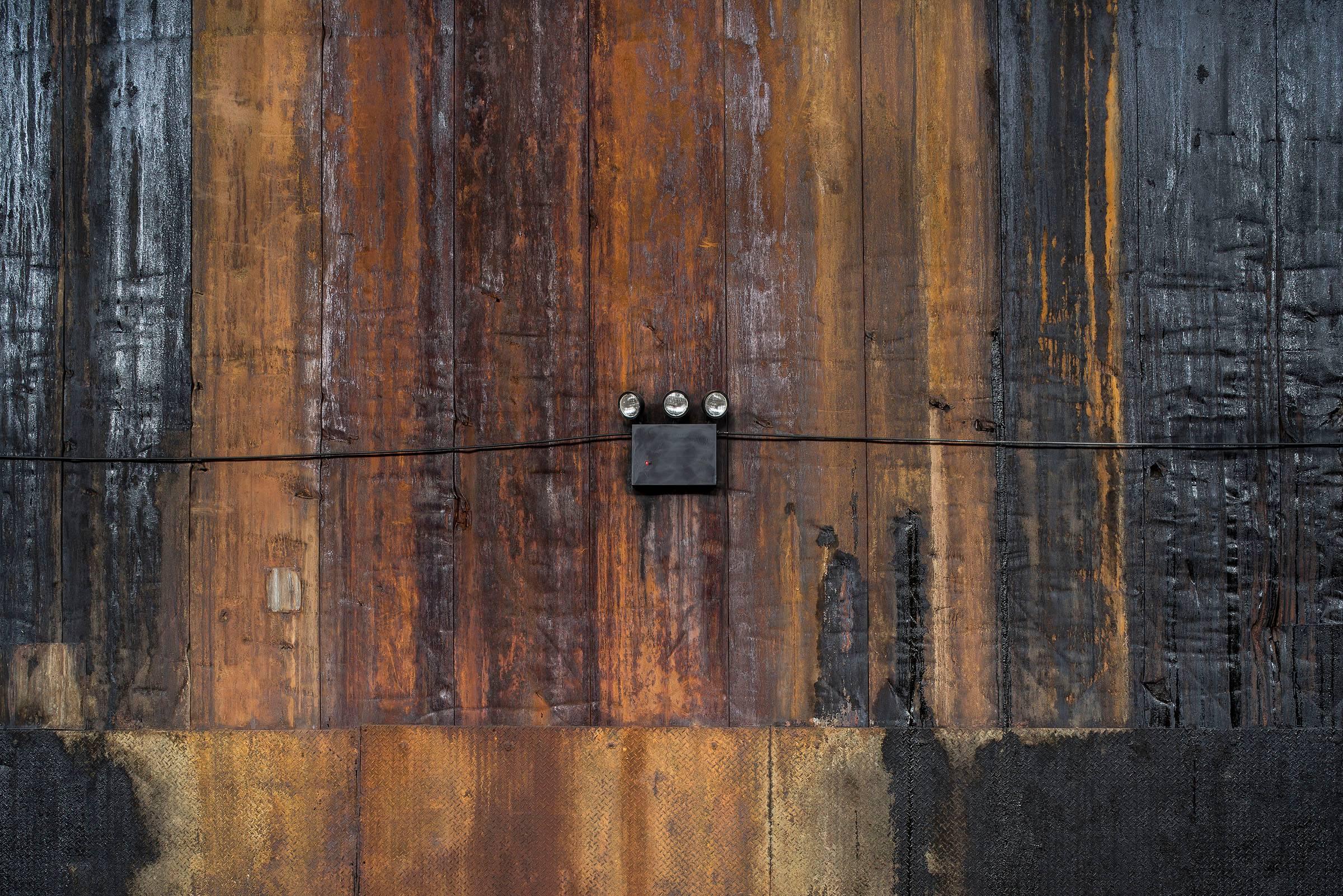 Paul Raphaelson Abstract Photograph - Raw Sugar Warehouse Wall