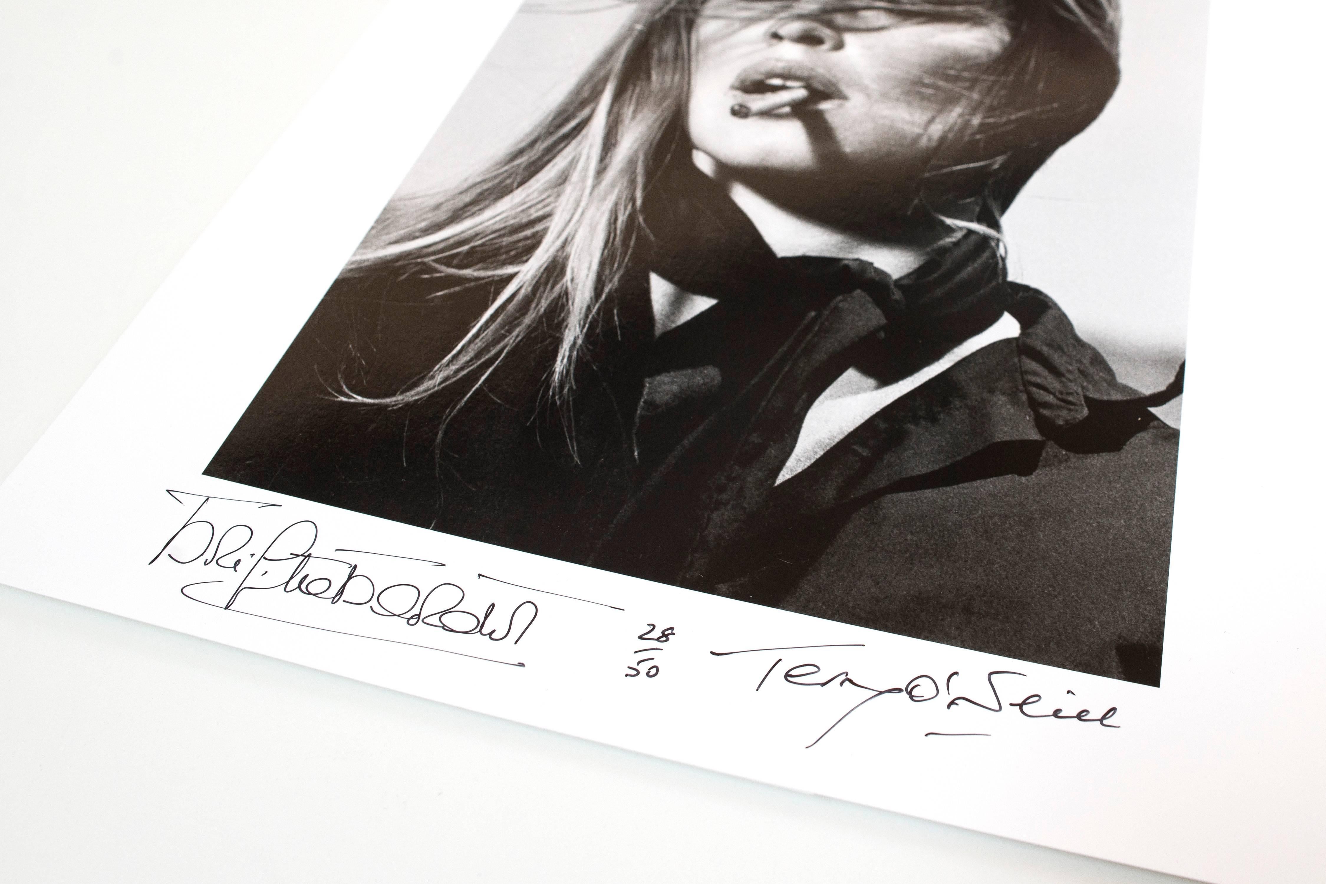 Co-Signed Brigitte Bardot with Cigar - Photograph by Terry O'Neill