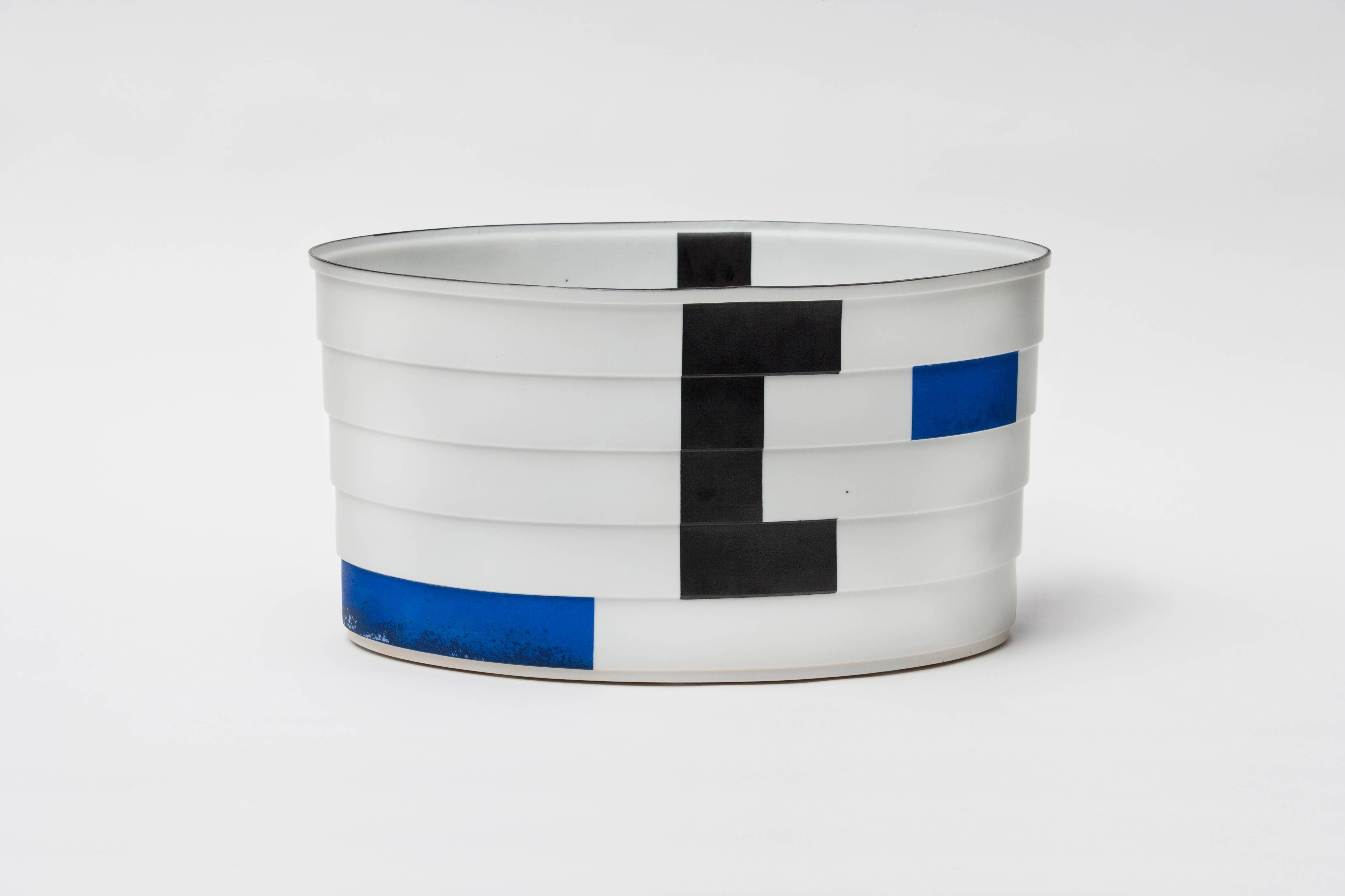 Bodil Manz blue, white, and black stepped porcelain vessel, made in Denmark 1