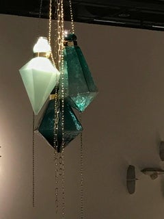 Green handblown glass crystal prism chandelier sculpture by Frida Fjellman