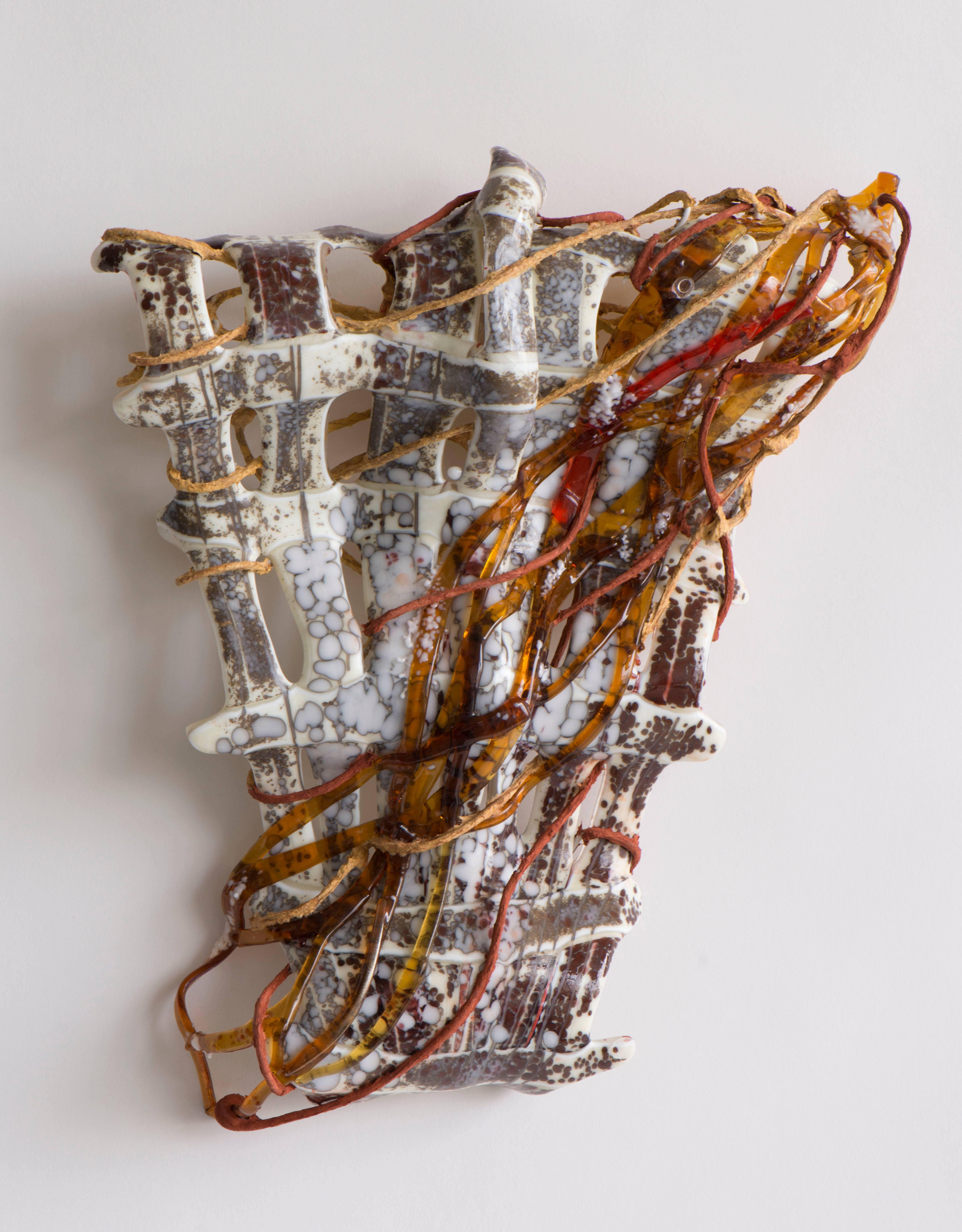 Nancy Cohen
Retained, 2017
glass, wire and handmade paper
16 x 13 x 4 in.

This abstract wall sculpture features white and copper glass mixed with metals and Cohen's signature handmade paper to form a unique biomorphic creation informed by Cohen's