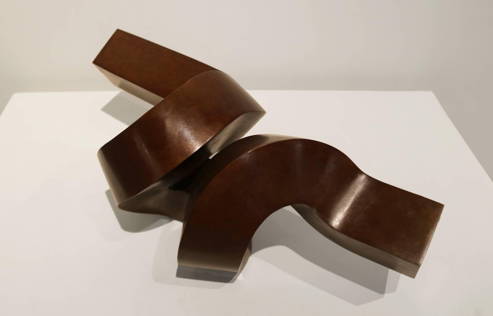 RIFF is a fabricated bronze sculpture finished with a rich 