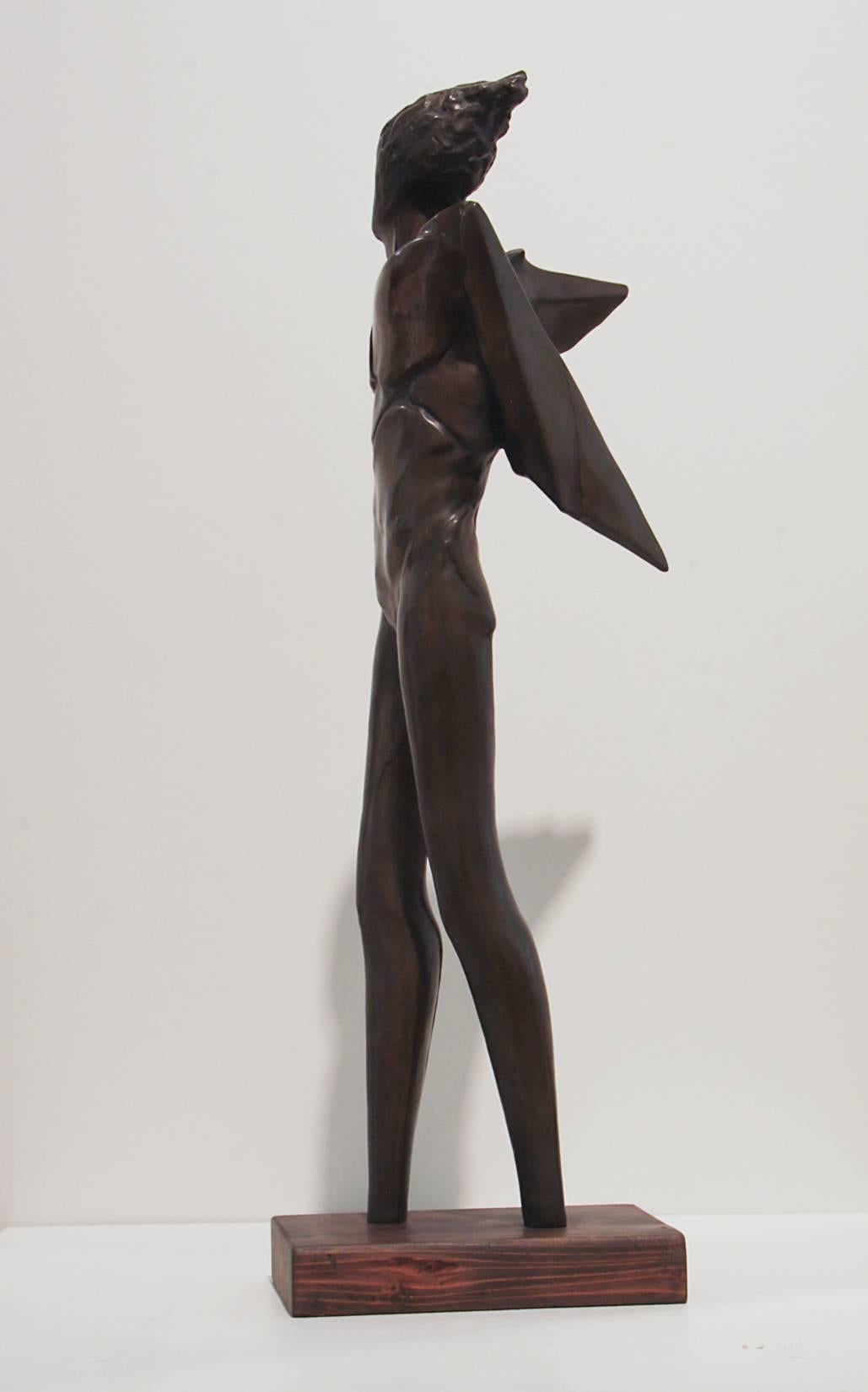 bronze figure posing rita