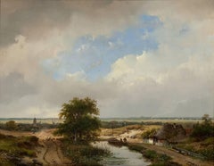 A dune landscape with Haarlem in the distance