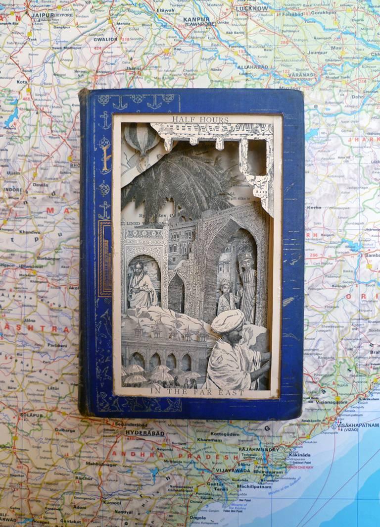 Half Hours in the Far East - framed and glazed blue mixed media sculpted book 