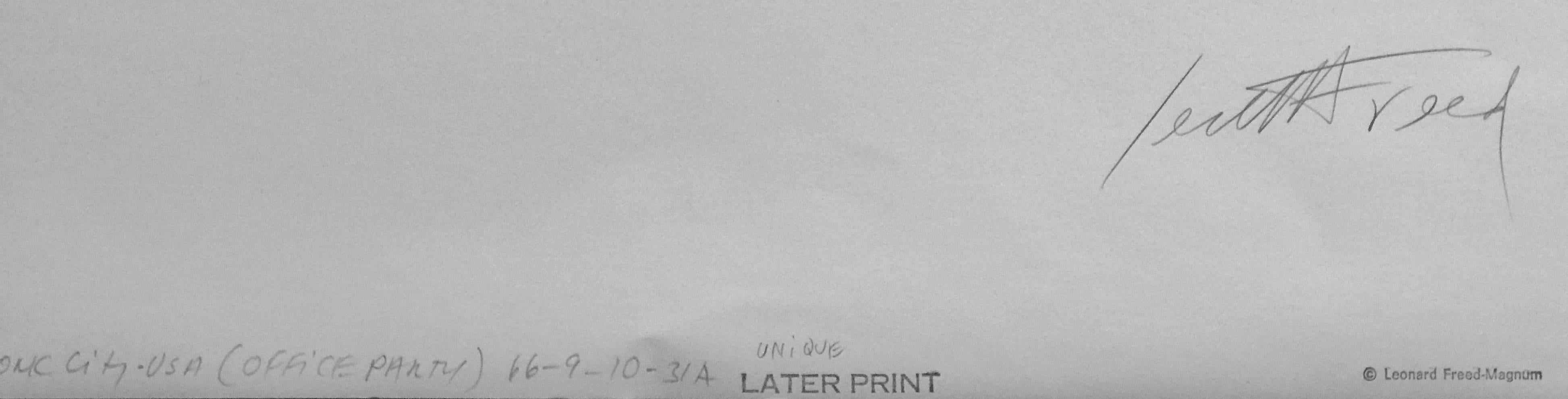 Office Party, New York City, 1966 by Leonard Freed is a gelatin silver later print, 16 x 20, signed verso (on back) by the photographer. Freed enjoyed storytelling, in all its forms. Here he captures the Mad Men zeitgeist of the 1960s when men in