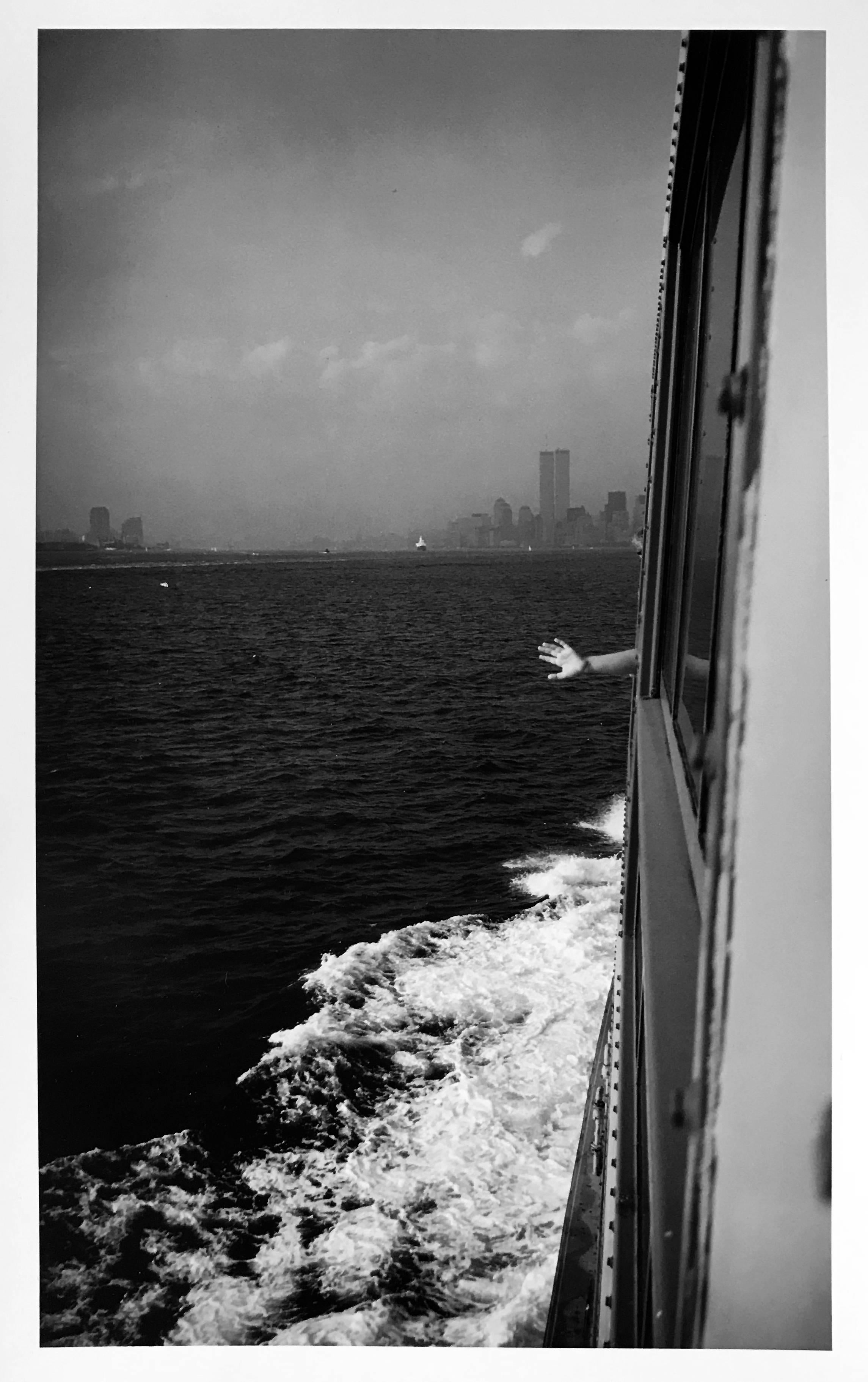 Roberta Fineberg Black and White Photograph - Wave Goodbye, Staten Island Ferry, New York City, Black and White Street Photo