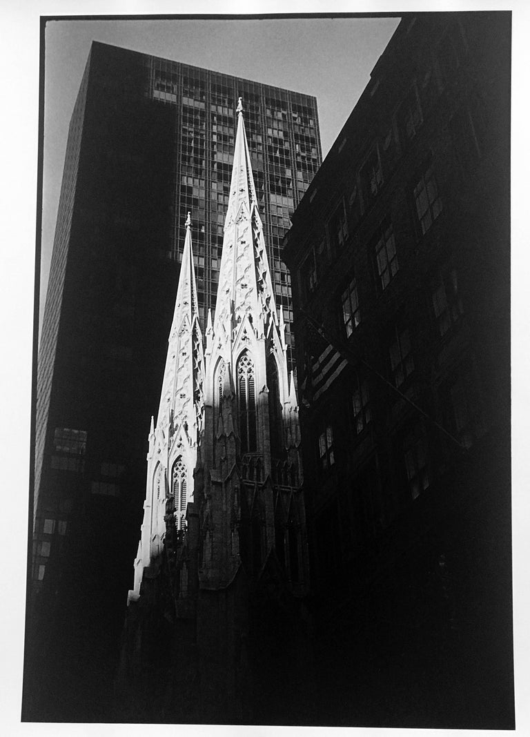 Trinity Church, Wall Street, 1995 by Leonard Freed is a 20" x 16" black and white, gelatin silver print, from the photographer's estate. The contemporary landscape photograph captures Freed's interest in New York City architecture, a city he loved,