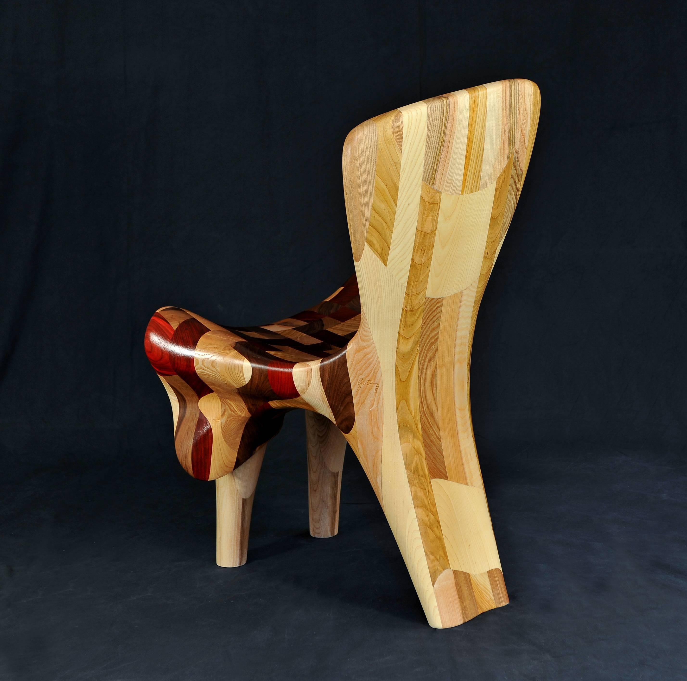 These wooden chairs – sculptures resemble delicate and elegant human figures, one is a “She” and the other a “He.” Gerenstein used sinuous curves and natural forms to establish spatial constructs and interactions that move beyond the humanly-defined