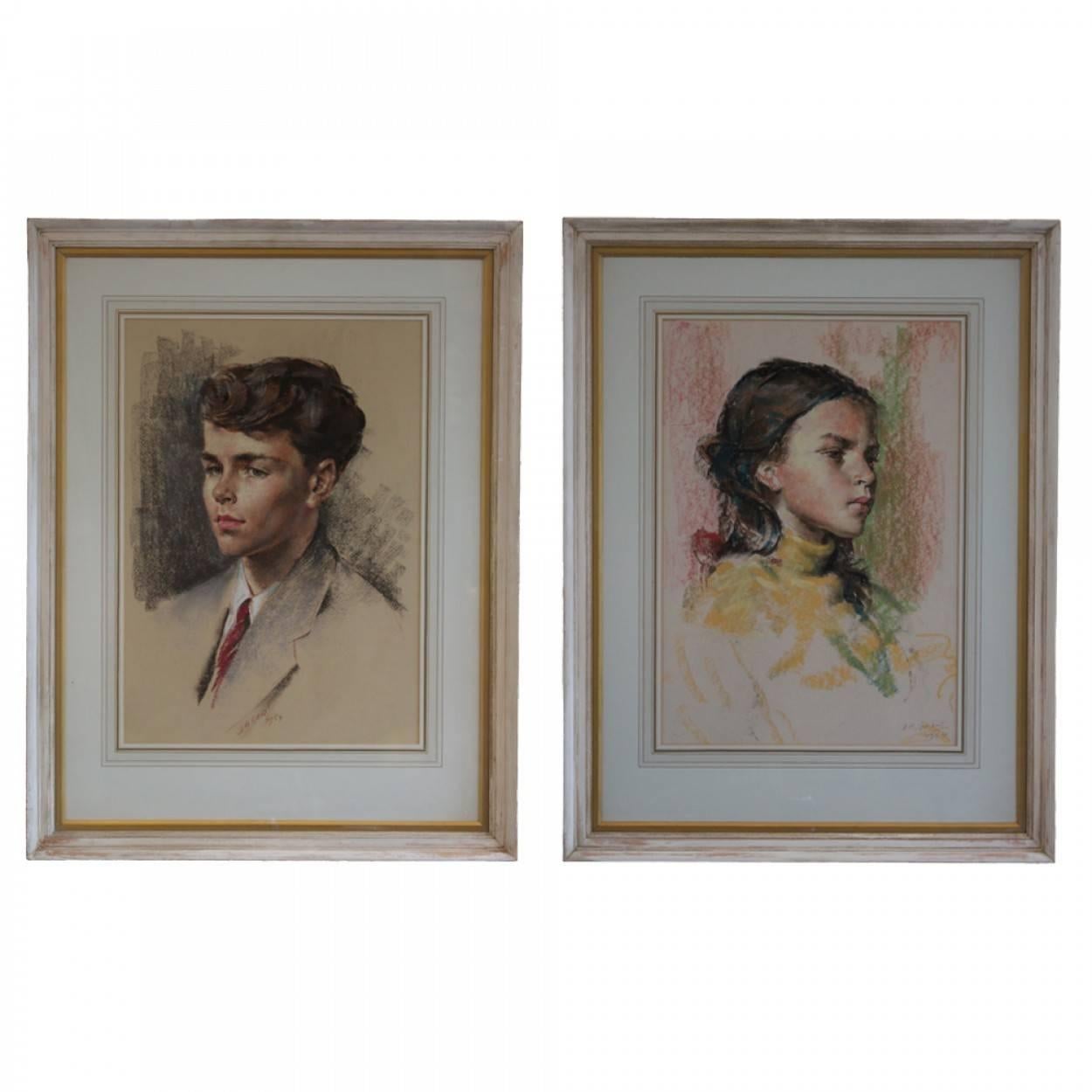 Delightful pair of pastel drawings by James Arden Grant (1887-1974), which are head and shoulder portraits of a boy and a girl, signed and dated 1954.

They are attractively mounted and framed in quality painted wooden frames.

The pictures measure