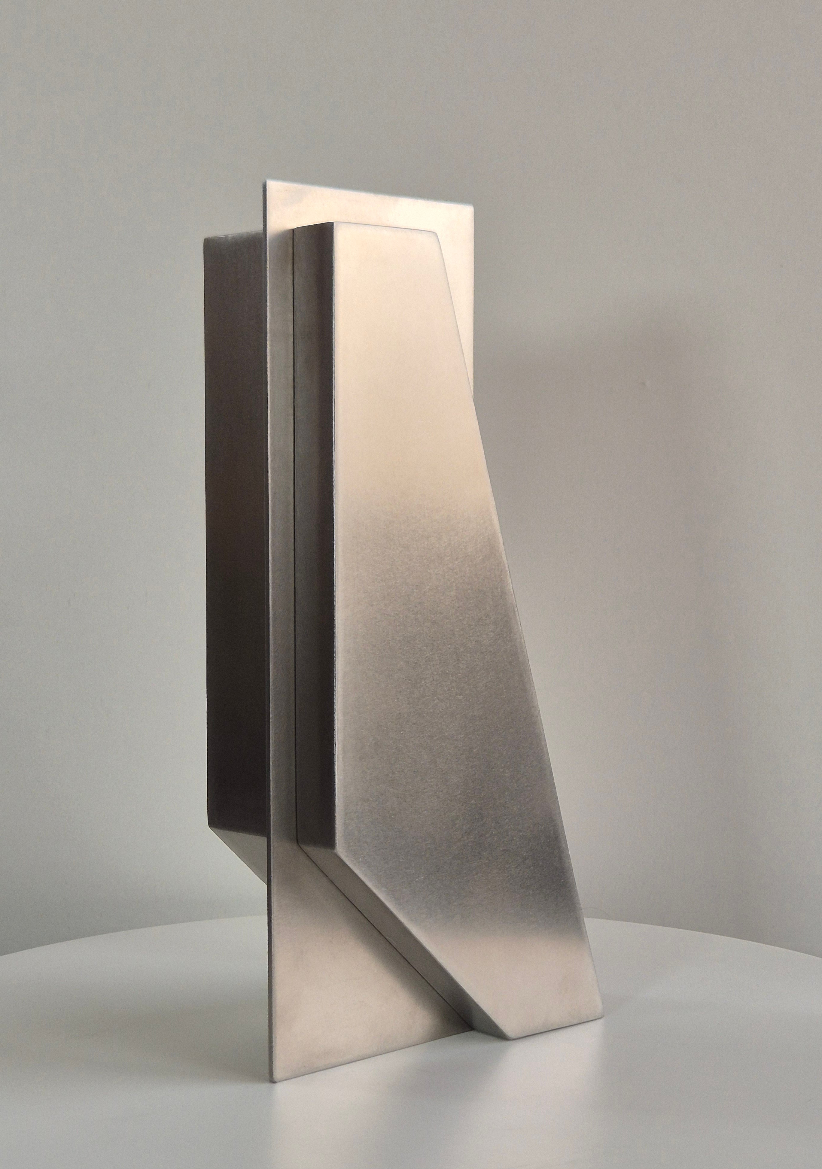 Posture (2022) by Julien Guarneri
Sanded stainless steel sculpture, 42 × 11 × 13 cm / 16.5 × 4.3 × 5.1 in. (Can be produced on a monumental scale - contact us for further information).
Guarneri’s work is driven by a constant pursuit of balance.