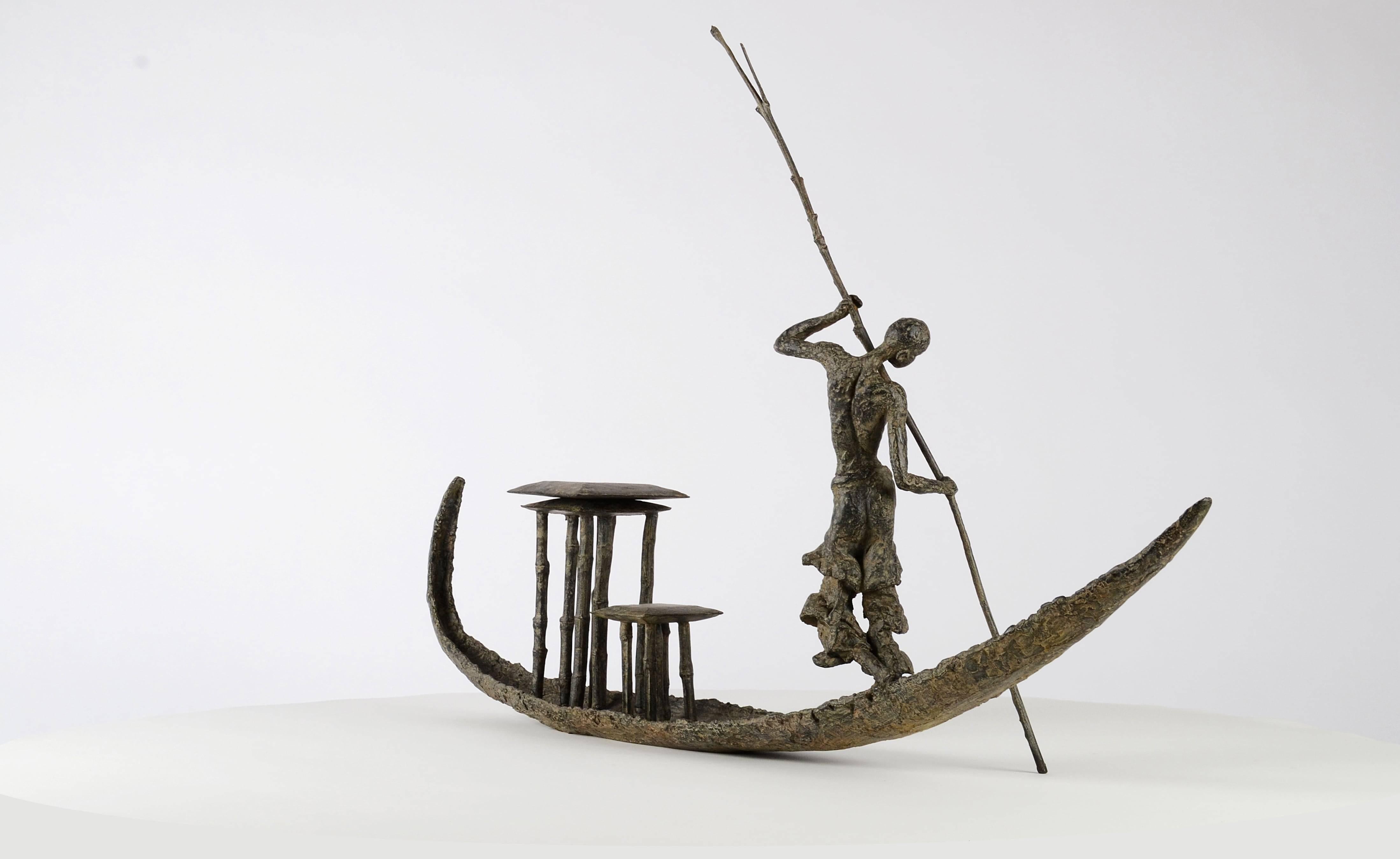 D'une Rive à l'Autre, Woman on a Dugout Canoe, Bronze Sculpture - Gold Figurative Sculpture by Marine de Soos