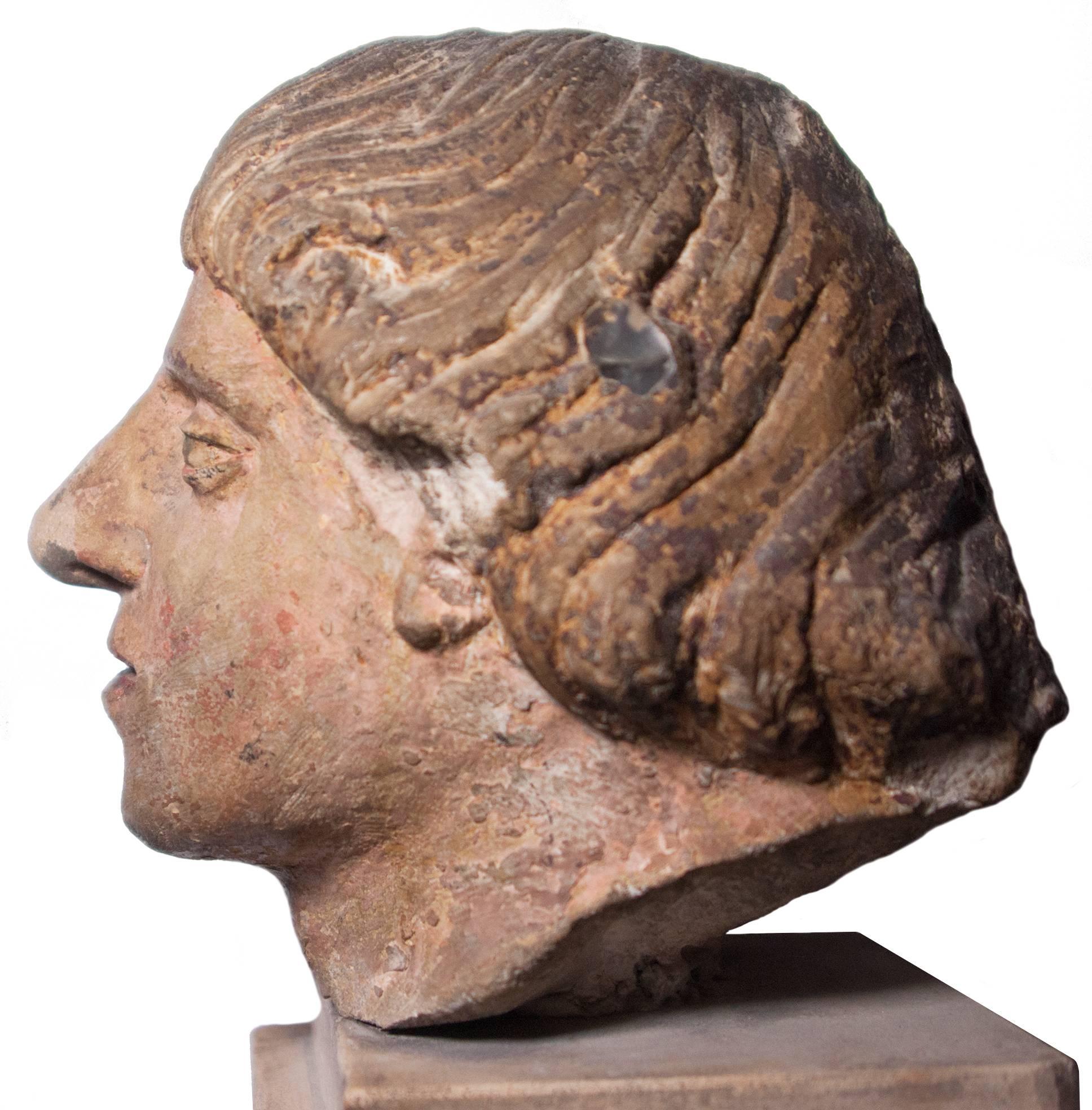 Beautiful head of a young man, probably a saint monk or deacon in painted limestone. It may be Saint Stephen.
The top of the head bears a small tonsure.
Very good state of conservation; the work has no apparent restoration, including the