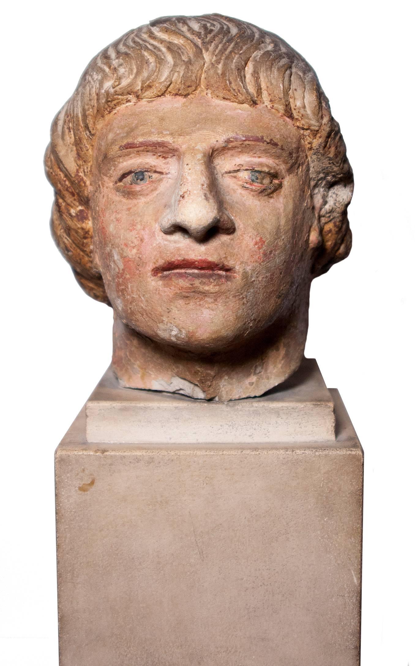 Head of a saint in painted limestone, XV th century For Sale 1