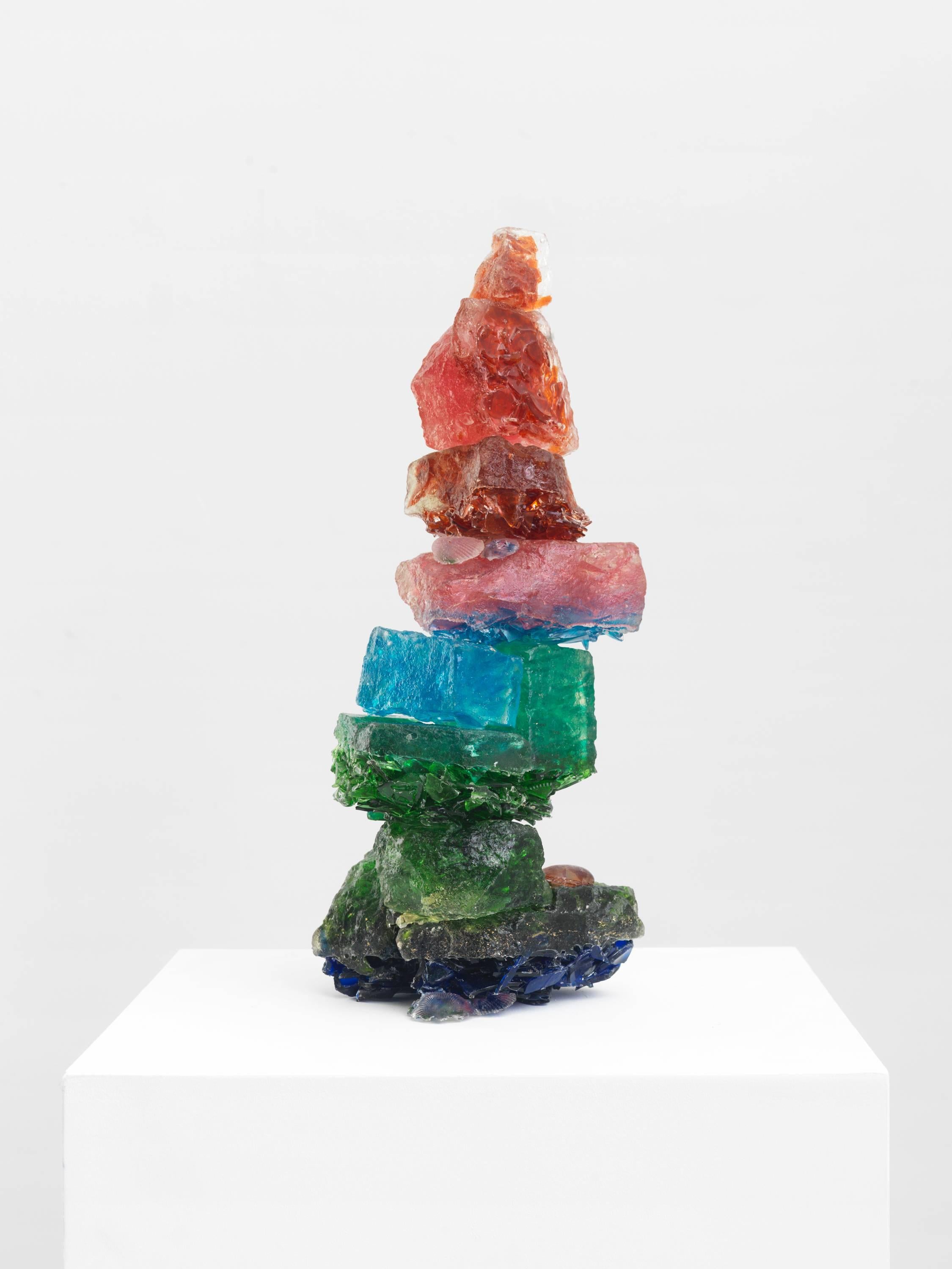 Owens is known for her sculpture made from recycled material and especially her signature process of casting shards of broken glass in resin. The glass, previously used in bottles and other containers, is smashed and reborn as luminous work of arts.