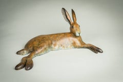 'Lying Hare' Solid Bronze Wildlife Sculpture with Brown Patina. Limited Edition.