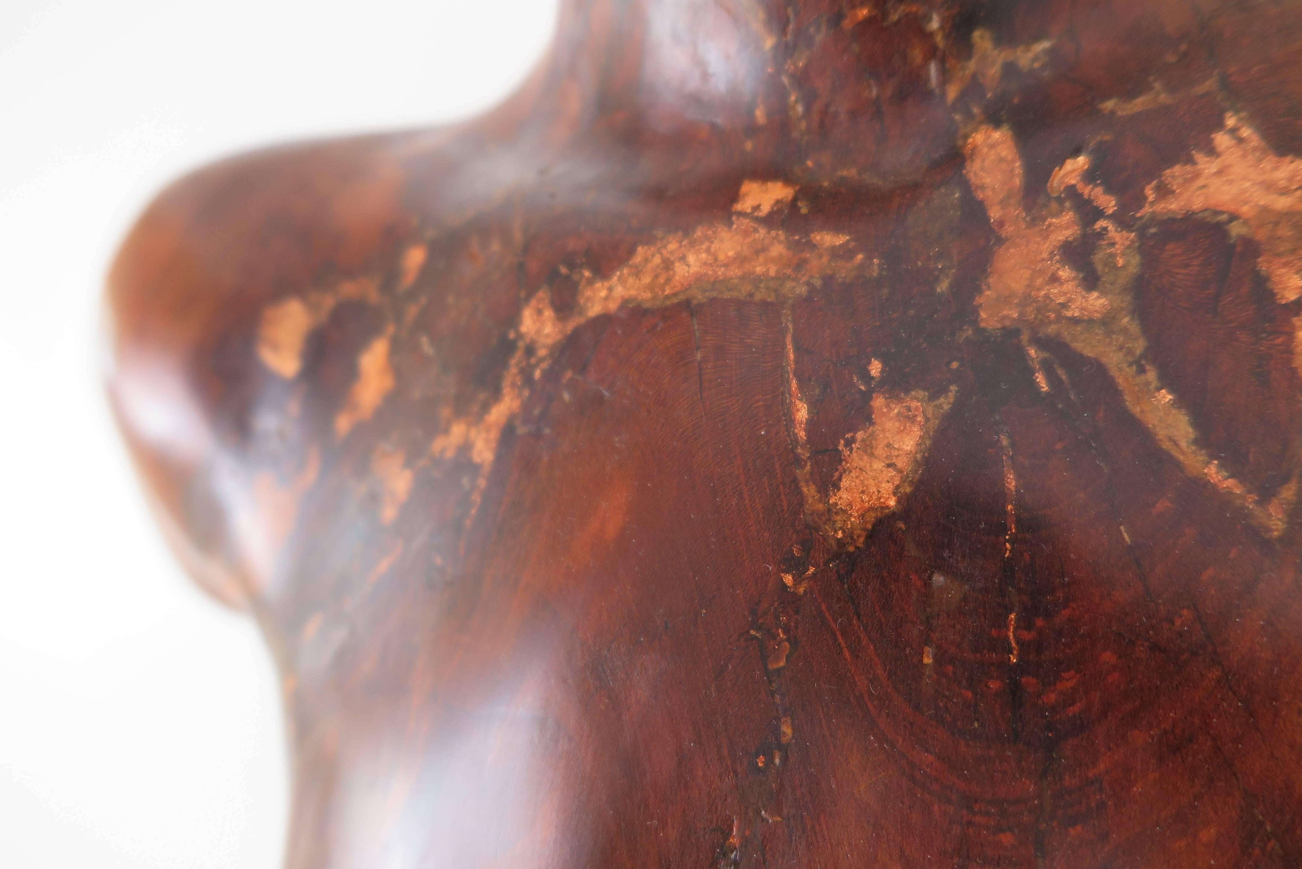 Hand carved figurative wood sculpture by Georgia artist Chad Awalt. 

