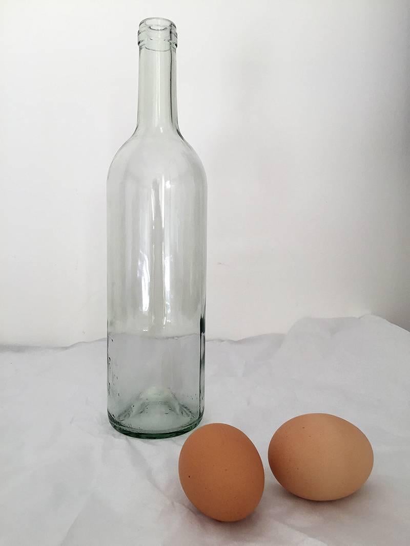 Lekha Singh Color Photograph - Bottle with Eggs