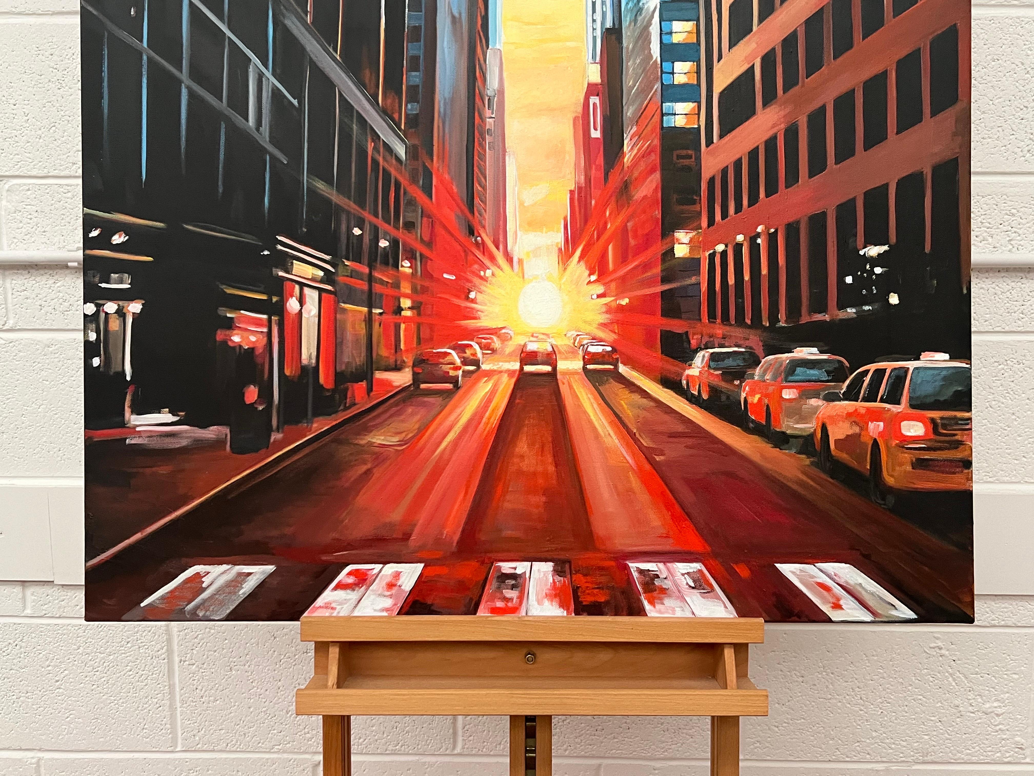 Manhattan Henge New York City Dramatic Sunset by British Urban Landscape Artist, Angela Wakefield. Painted using strong blue, red and yellow primary colours, this striking original forms part of her New York Series. 

Art measures 36 x 48