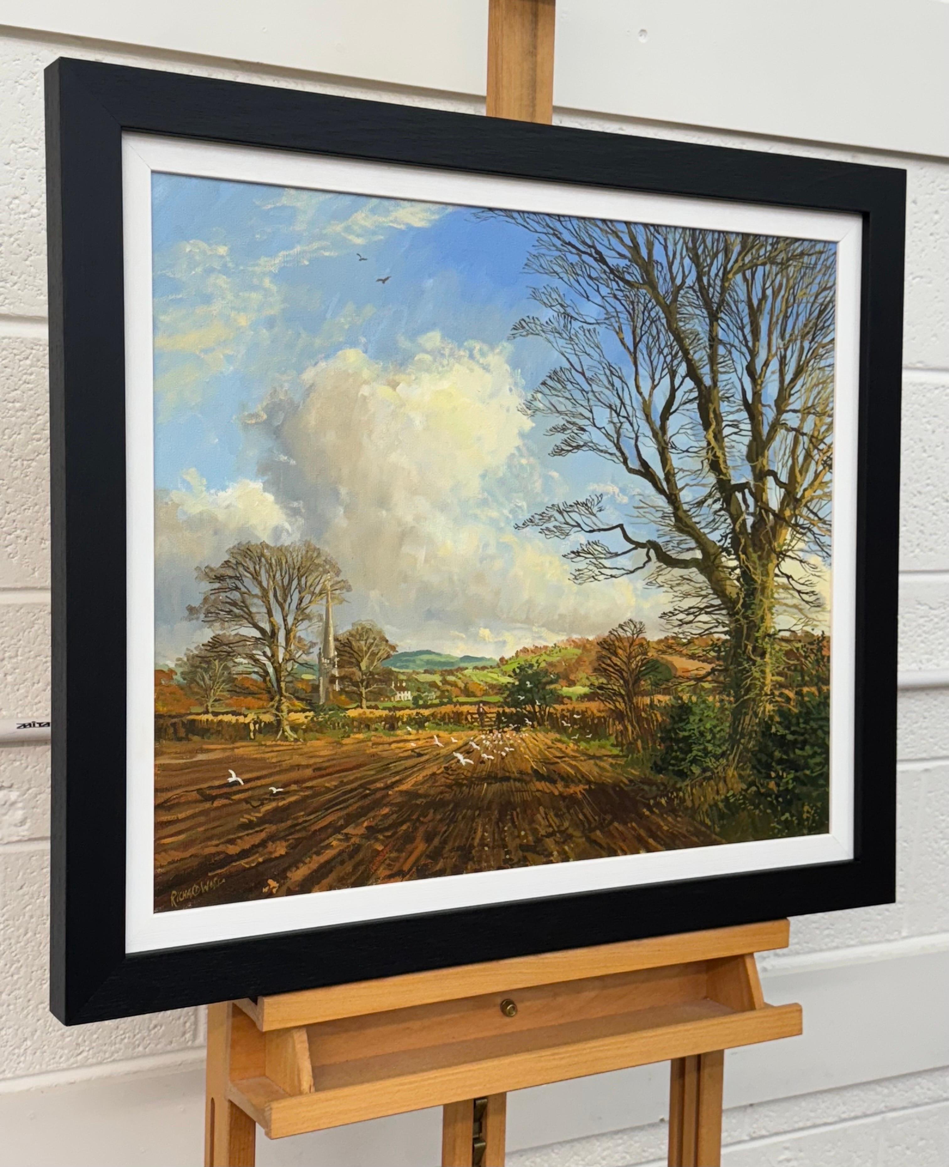 Paisaje invernal con gaviotas en campos arados de la campiña inglesa - Painting de Richard Wood