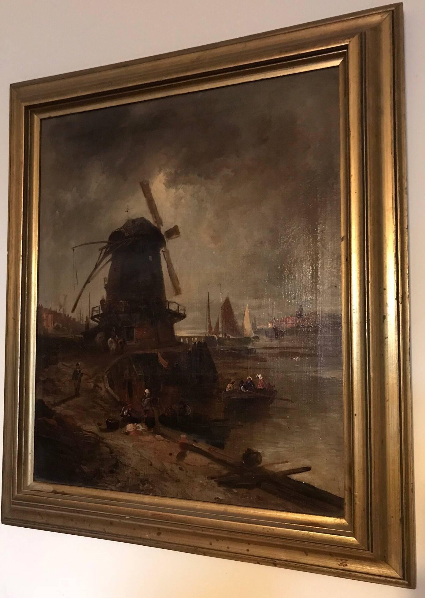 Oil on Canvas depicting a Dutch Harbour scene with Windmill set within a Gilt frame.
