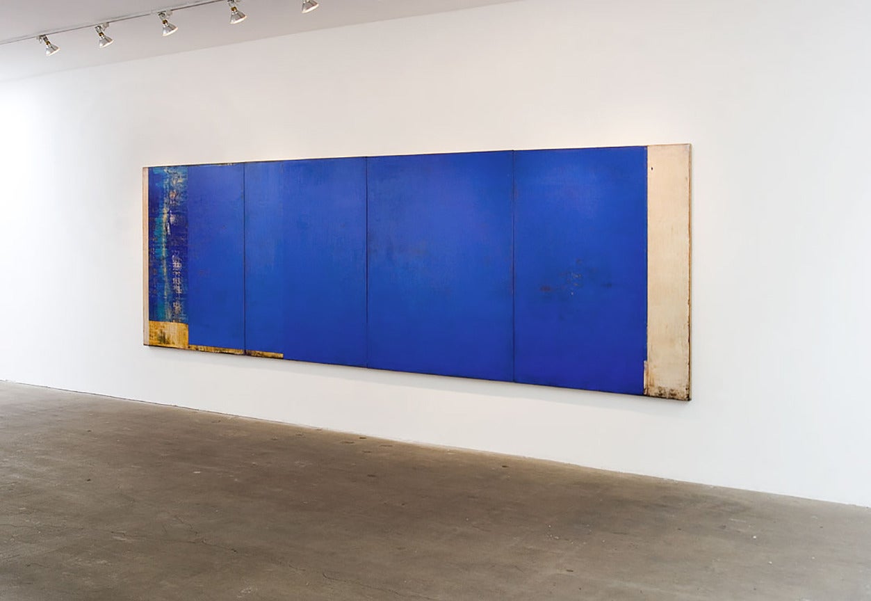 Daniel Brice, OX 31, oil on burlap over panel, blue color field, 64x192 inches
four panels. 

Burnished layers of oil paint in shades of blue and white form a buttery surface over the rough burlap base still visible on the edges of the panels.