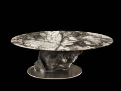 "Meteorite", Italian marble table with sculptural metal base