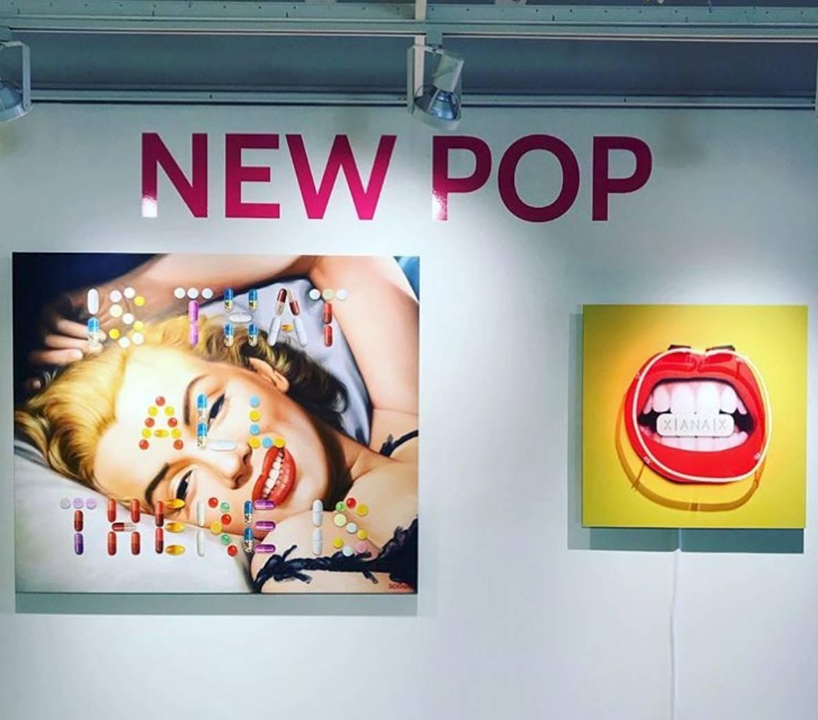 Yellow and red neon print, xanax, mouth photo. 
Neon tubes on photographic print on aluminum dibond. Neon installation, bright colors. Contemporary wall piece. 
Sara Zaher is a visual artist based in New York.
Recently she completed her MA (Dist) in