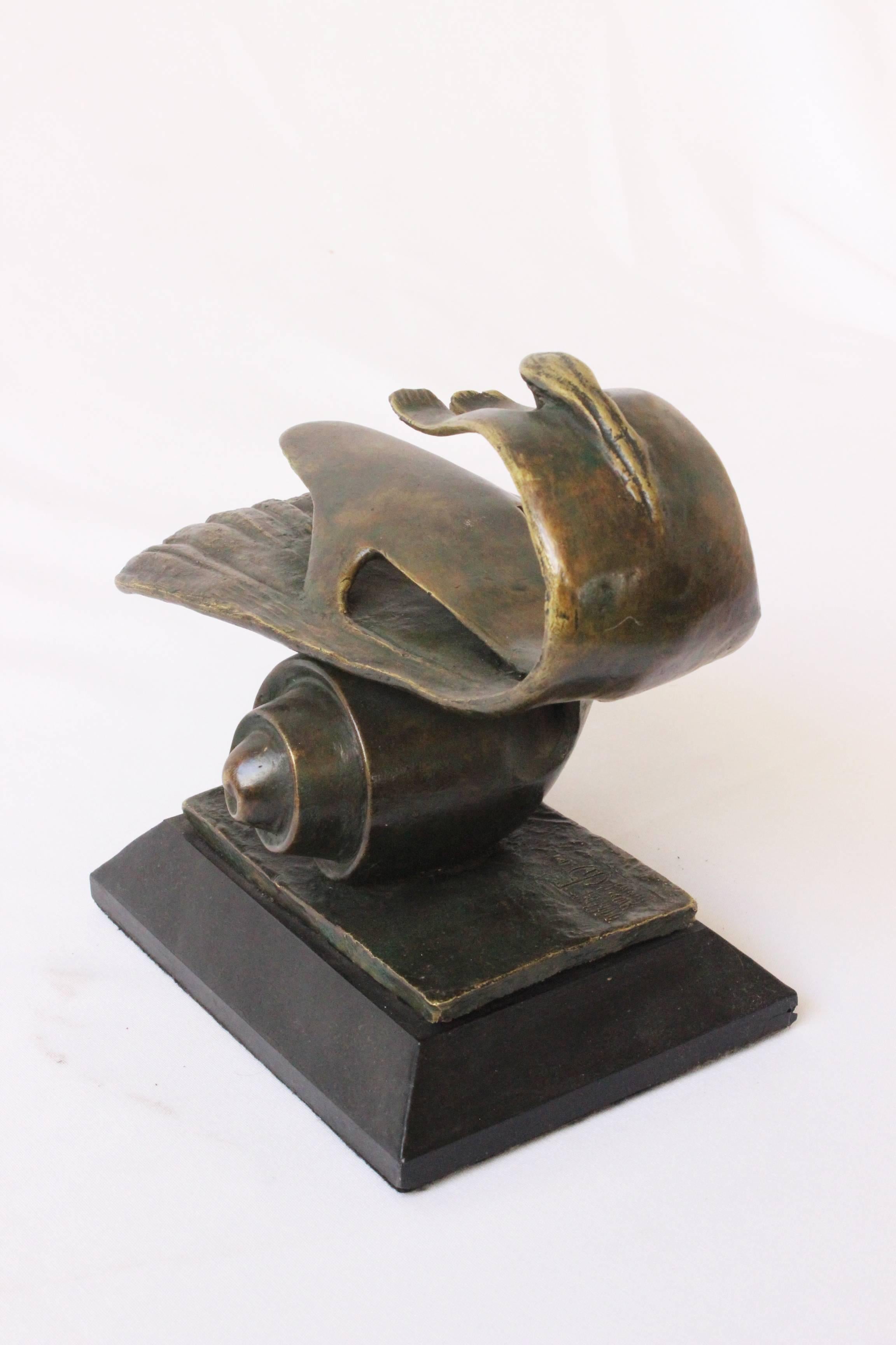 Nature as Mother
Adrián Reynoso
Lost Wax Bronze
18 x 25 x 20 cm
2005, MX
With wood base

The La Naturaleza Como Madre sculpture, the work of artist Adrian Reynoso from Guadalajara, is an undulating structure in bronze and polymer resin that depicts