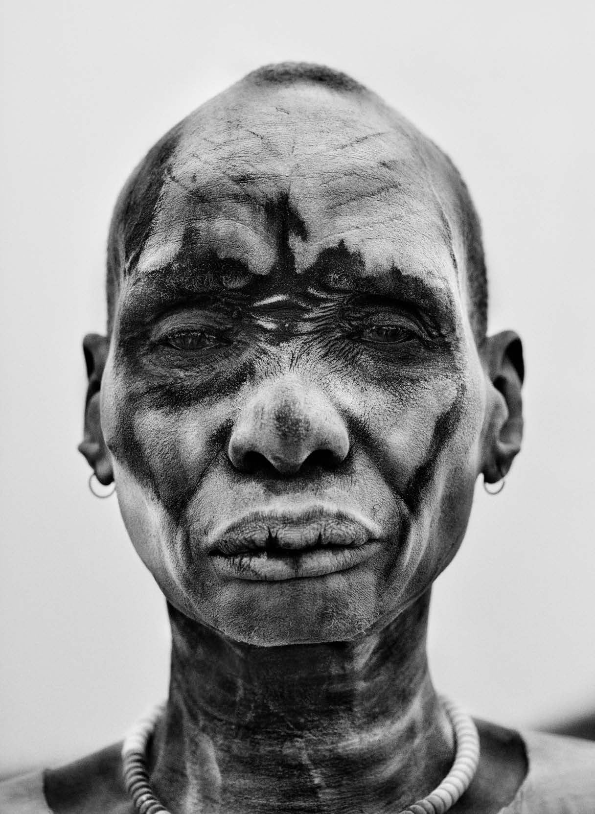 Dinka Man, Southern Sudan, 2006 
Sebastião Salgado
Stamped with photographer's copyright blind stamp
Signed, inscribed on reverse
Silver gelatin print
16 x 20 inches

Undertaking projects of vast temporal and geographic scope, Sebastião Salgado