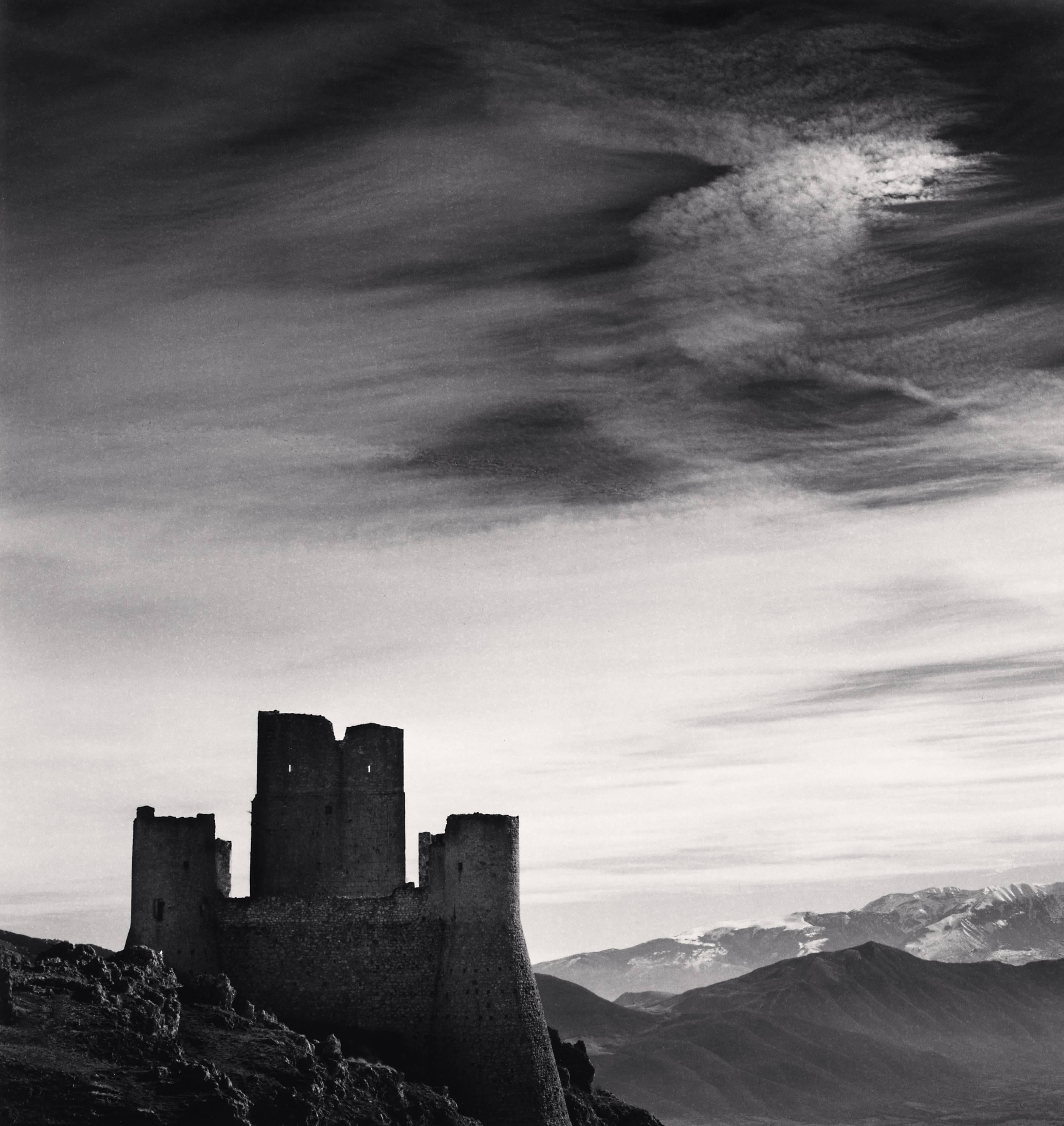 Castle and Sky, Rocca Calascio, Abruzzo, Italy, 2016 - Michael Kenna 
Signed, dated and numbered on mount
Signed, dated, inscribed with title and stamped with photographer's copyright ink stamp on reverse
Sepia toned silver gelatin print
8 1/4 x 7