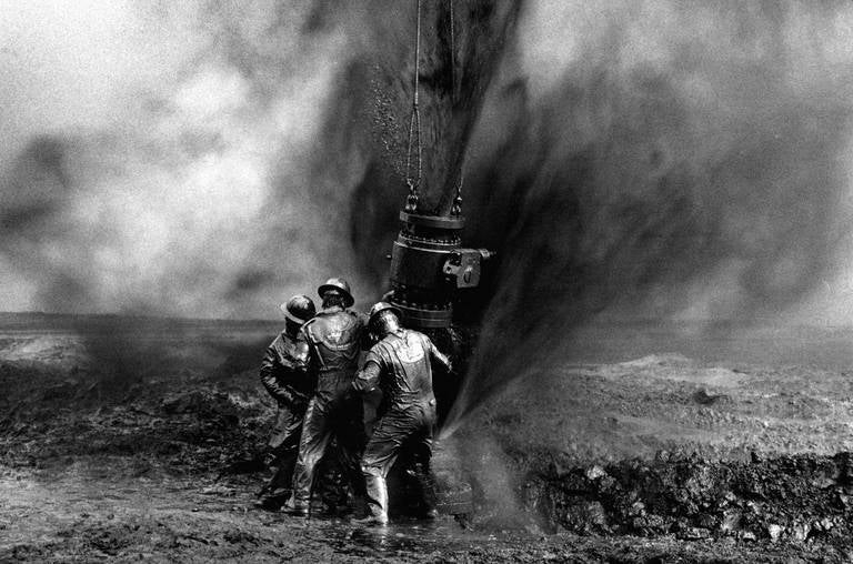 Desert Hell, Kuwait, 1991 - Black and White Photography
Sebastião Salgado
Stamped with photographer's copyright blind stamp
Signed, inscribed with title and date on reverse
Silver gelatin print
20 x 24 inches

Undertaking projects of vast temporal