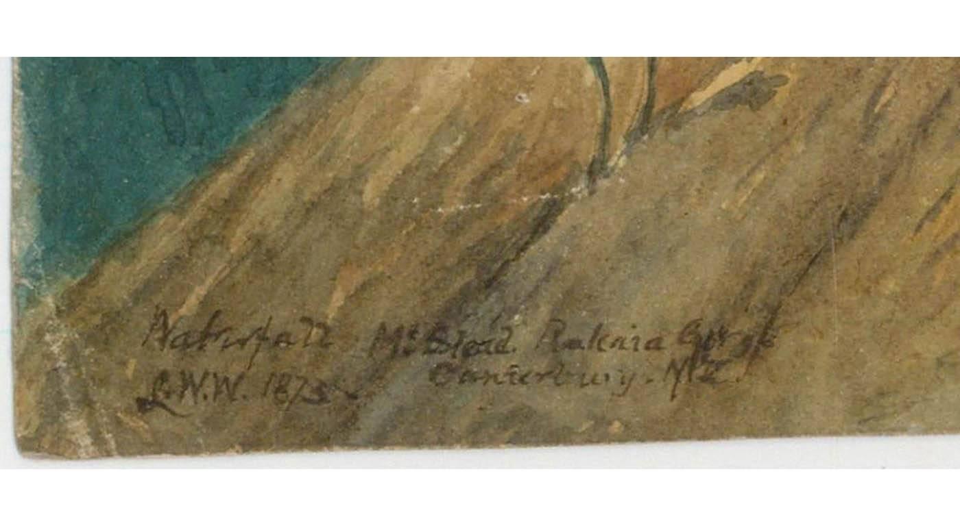 A signed 1973 Victorian watercolour by Laurence William Wilson (1852-1912), depicting a waterfall at Mount Stead, Rakaia Gorg, Canterbury, New Zealand. Titled, monogrammed and dated to the lower left. Further signed, dated and inscribed verso.