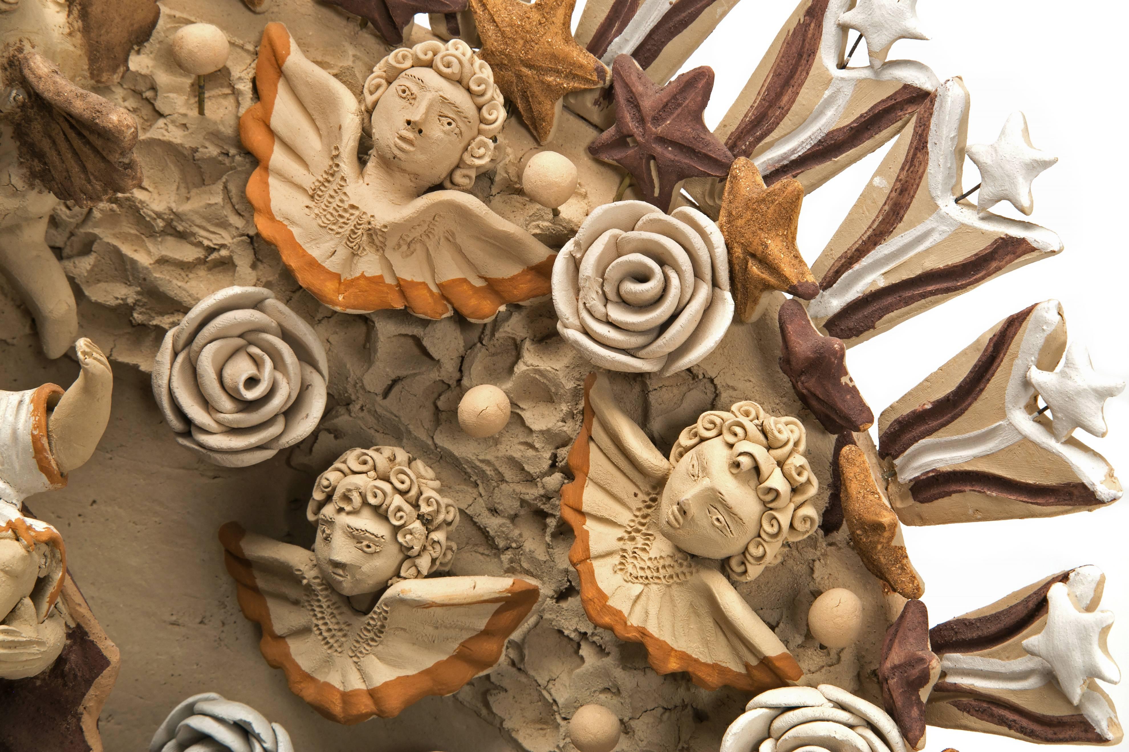 Artisan : Enedina Vaszquez Cruz

MASTERPIECE 

Fabriqué avec de l'argile naturelle. Technique de modelage à la main et cuisson au four à bois. 

- Dimensions : 19