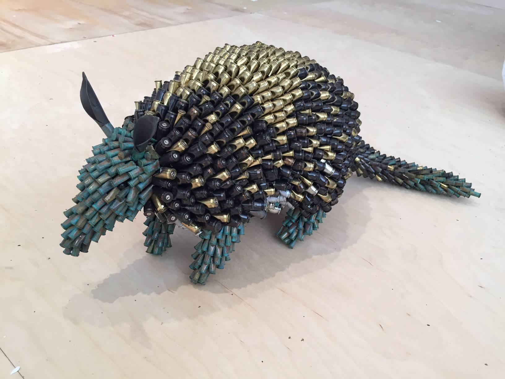 Federico Uribe Figurative Sculpture - Armadillo (Green Face)