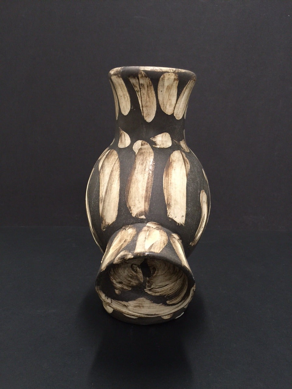 Original Pablo Picasso Ceramic Vase, made of white earthenware clay, hand - painted with black and brown.From the edition of 500. Inscribed Madoura/Edition Picasso on verso. 
(AR 605)