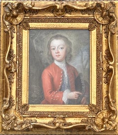 Antique 18th century pastel portrait of a young boy in a wooded landscape