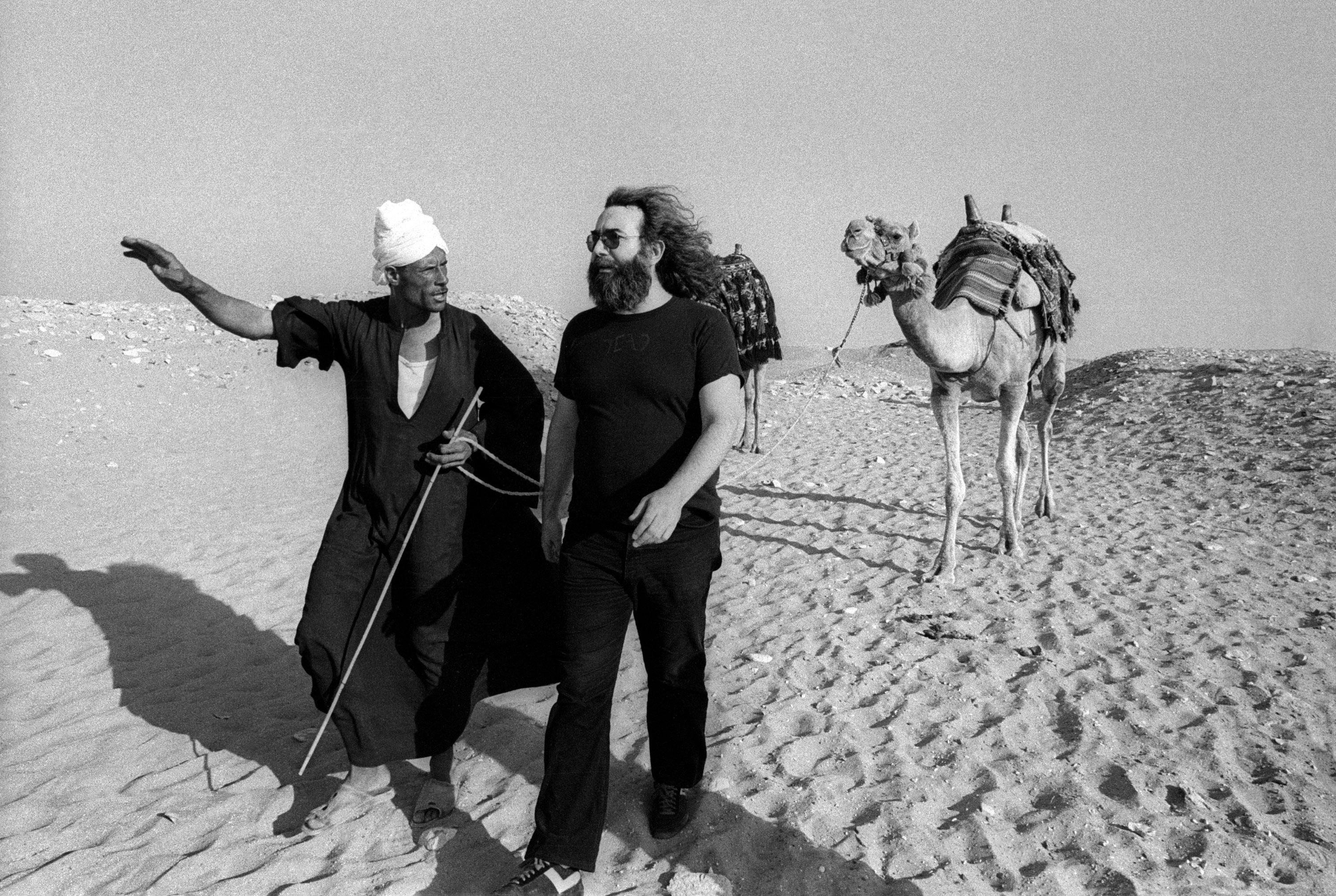 Adrian Boot Black and White Photograph - Jerry Garcia with guide at the Pyramids