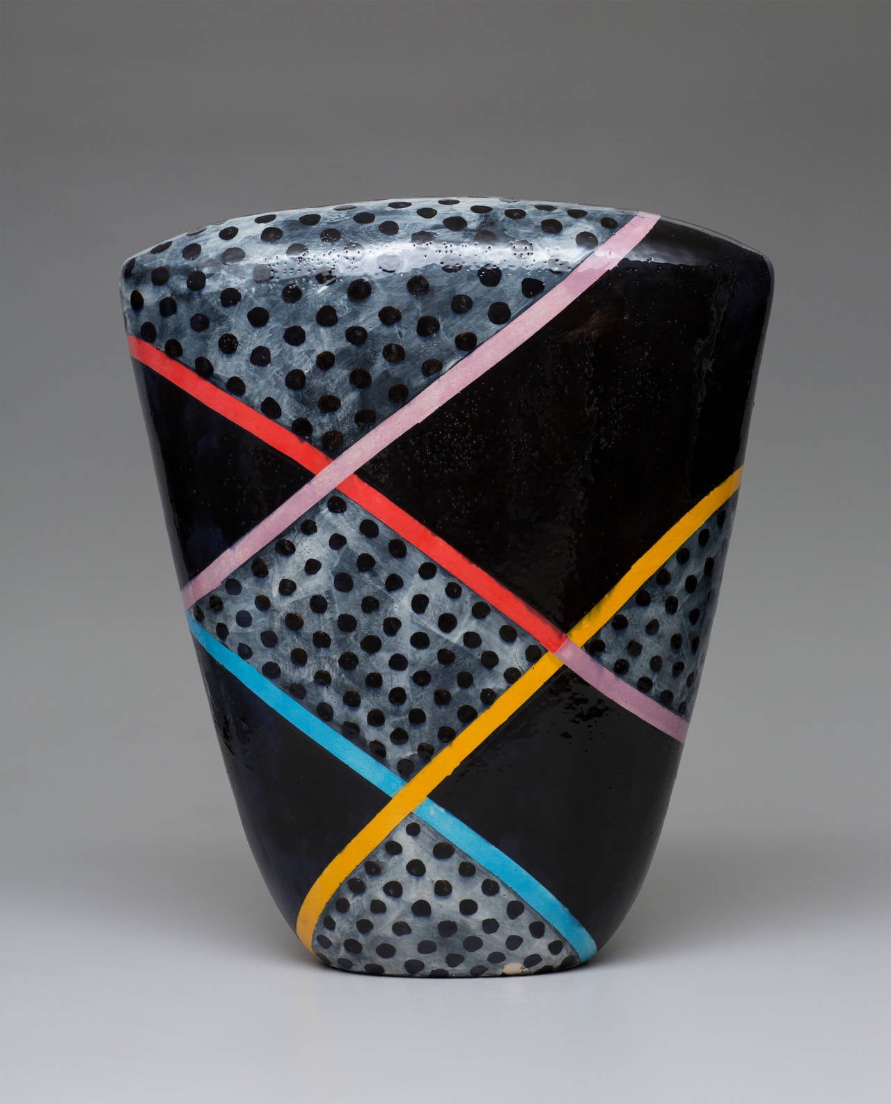 Jun Kaneko, born in Nagoya, Japan in 1942, has continually experimented with the traditional bounds of the ceramic medium. He moved to the United States in 1963 and studied with noted ceramic artists Peter Voulkos, Paul Soldner, and Jerry Rothman.
